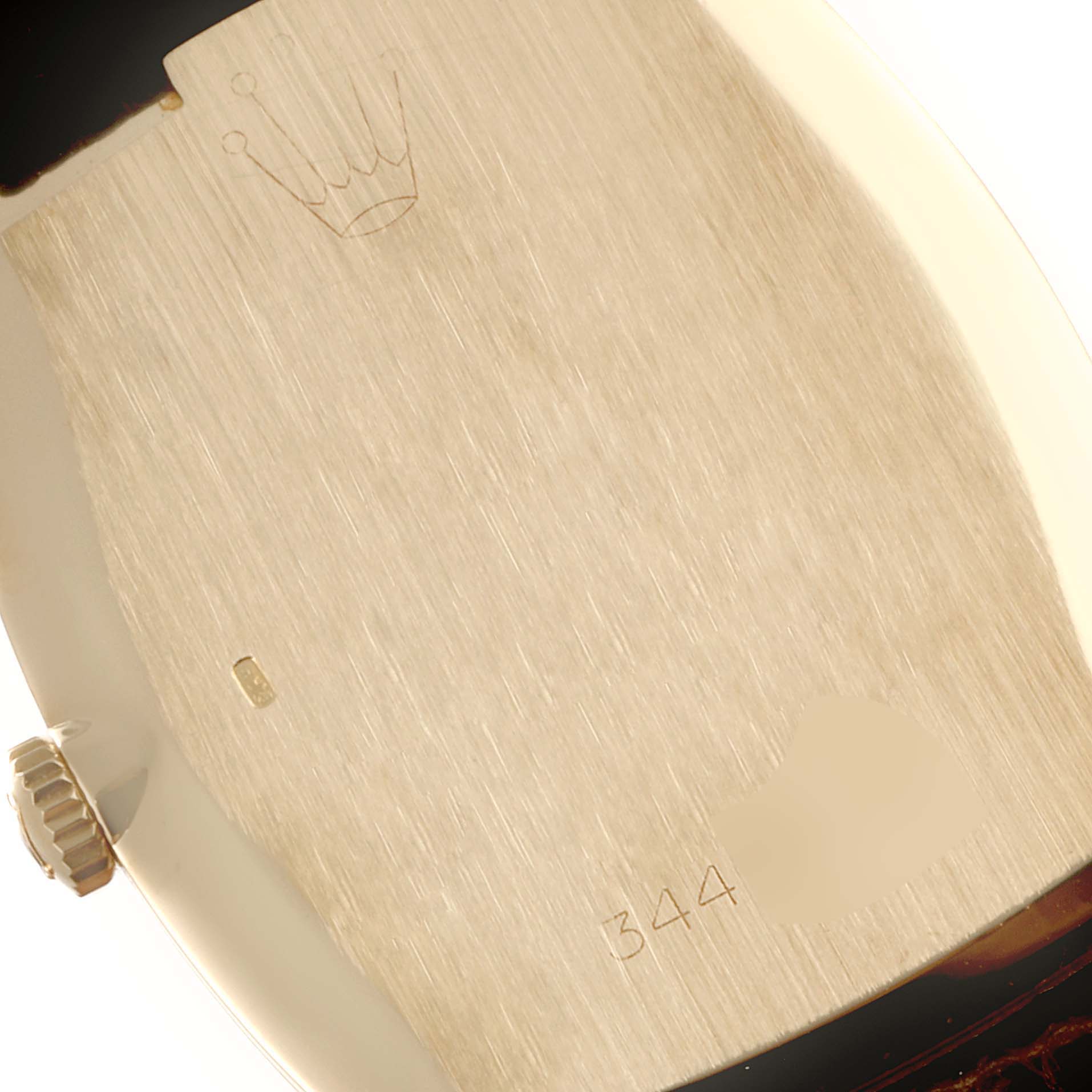 This image shows the case back and crown of a Rolex Cellini 3807 Women's Yellow Gold Champagne Dial 3807 Women's Yellow Gold Champagne Dial watch, viewed from the reverse angle.