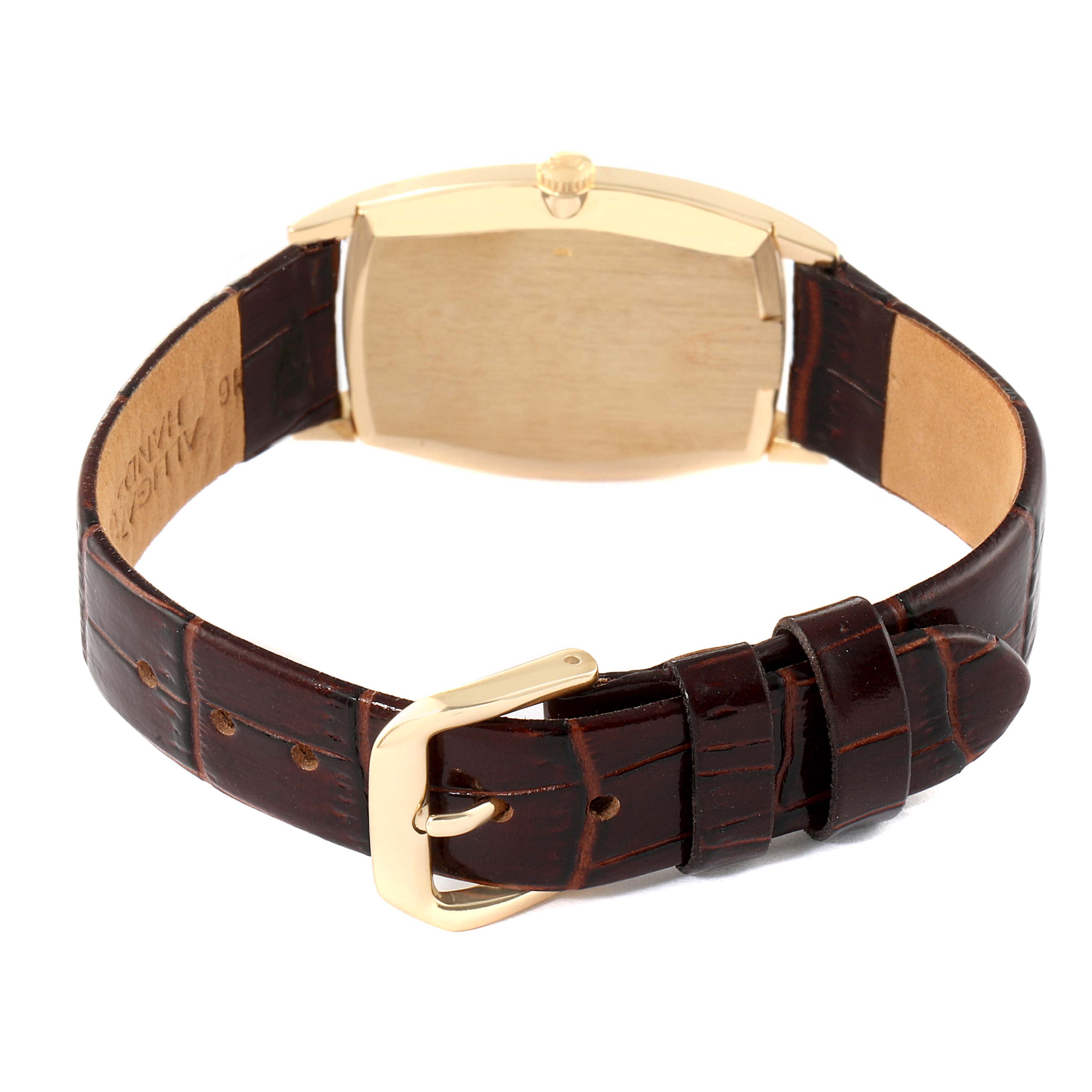 The image shows the back view of a Rolex Cellini 3807 Women's Yellow Gold Champagne Dial 3807 Women's Yellow Gold Champagne Dial watch, highlighting the case back and leather strap with a buckle.