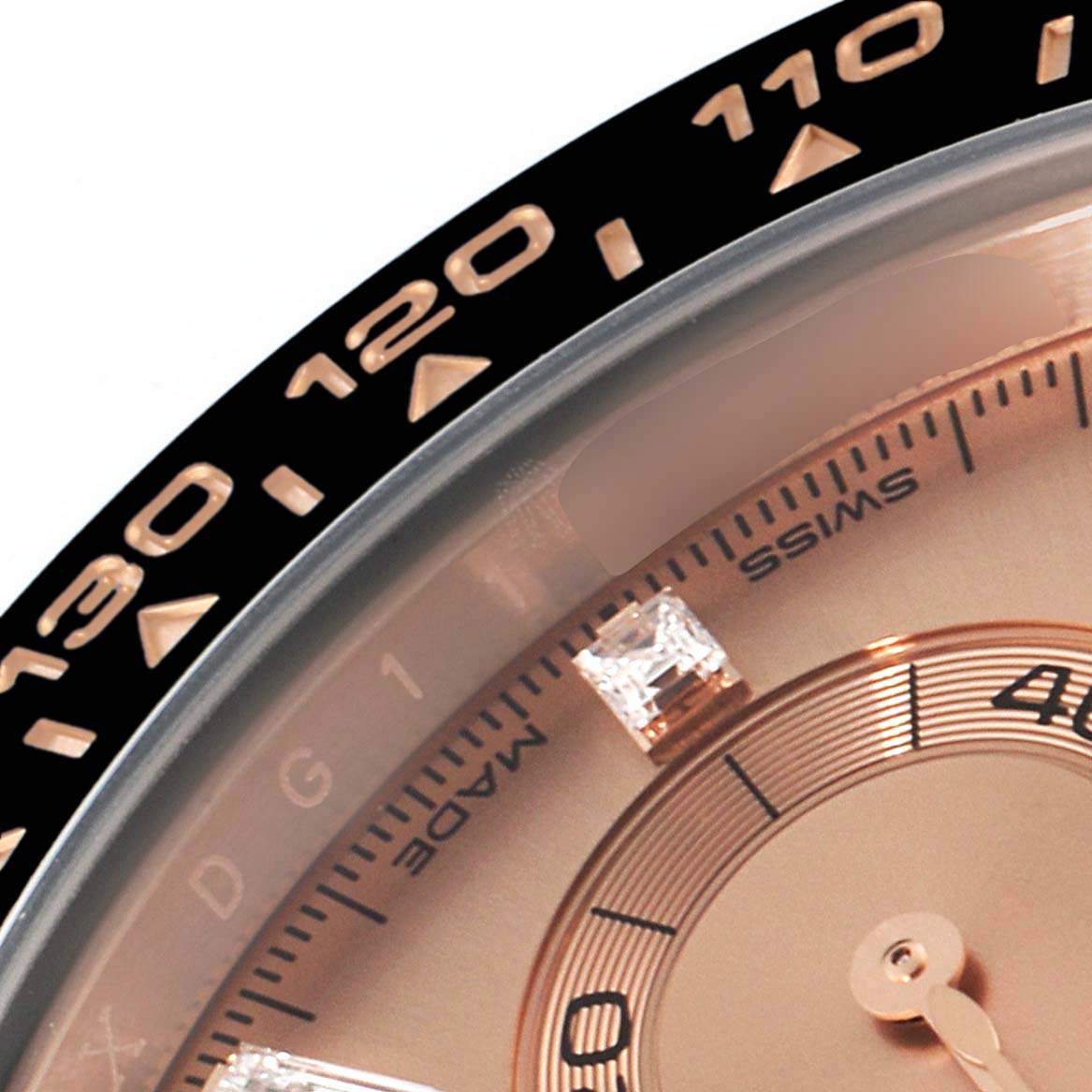 The image shows a close-up of the dial and bezel of a Rolex Daytona 116515LN Men's Rose Gold  116515LN Men's Rose Gold  watch at an oblique angle.