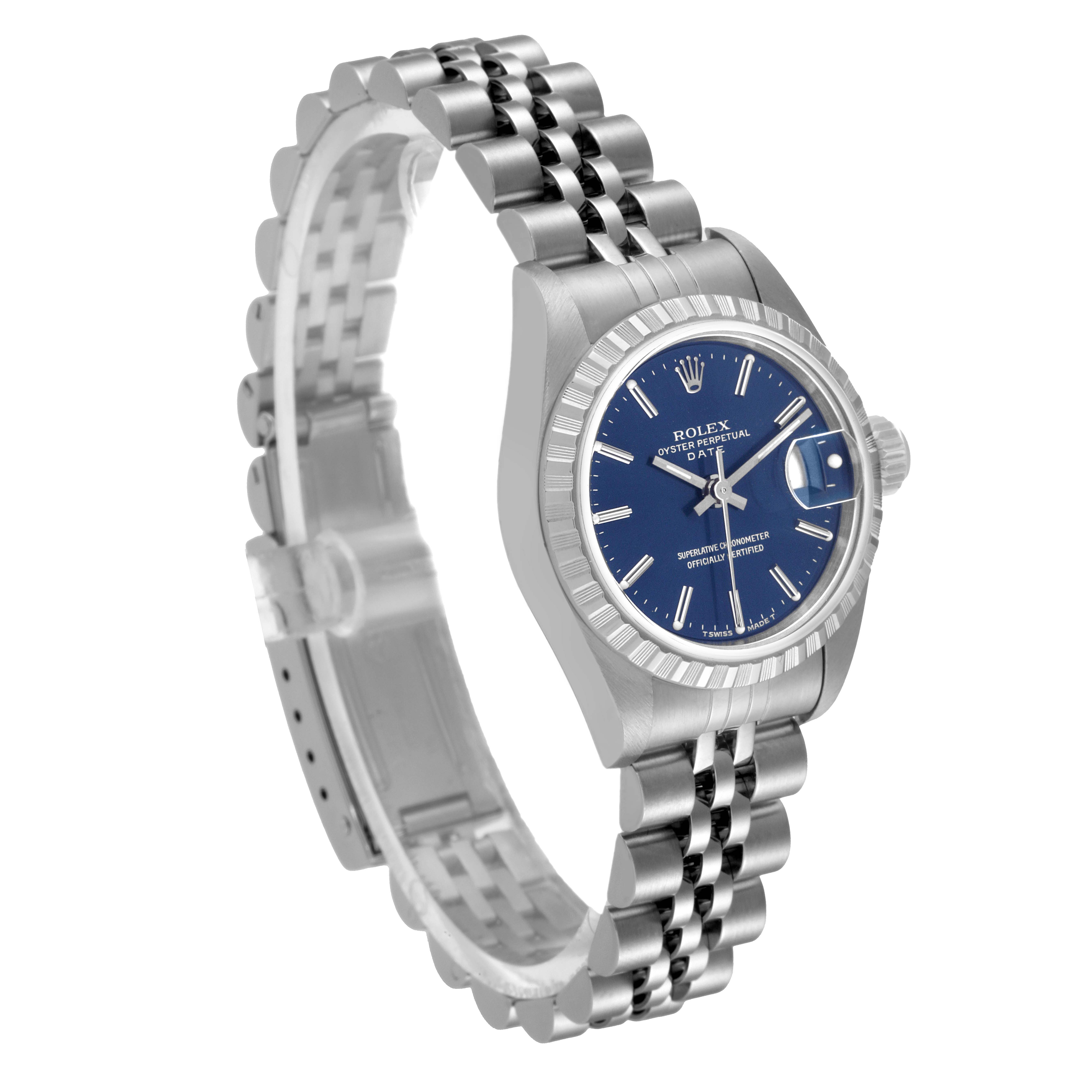The image shows a three-quarter view of a Rolex Date 69240 Women's Stainless Steel Blue Dial 69240 Women's Stainless Steel Blue Dial model watch with a blue dial and silver bracelet.