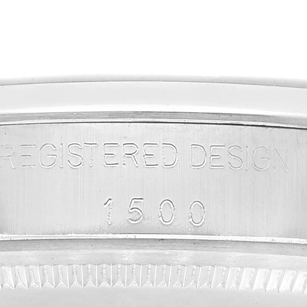 This image shows a close-up of the side case of a Rolex Vintage Collection 1500 Men's Stainless Steel Silver Dial 1500 Men's Stainless Steel Silver Dial model, revealing the "Registered Design" and model number "1500."