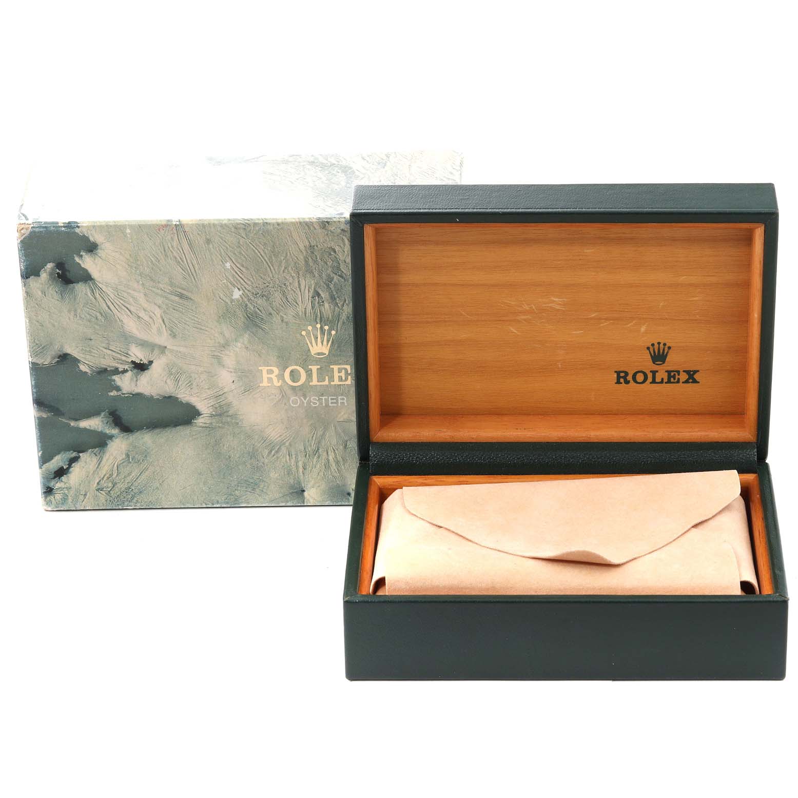 The image shows the box for a Vintage Collection Rolex watch, with the box and packaging partially open, revealing a cloth case inside.