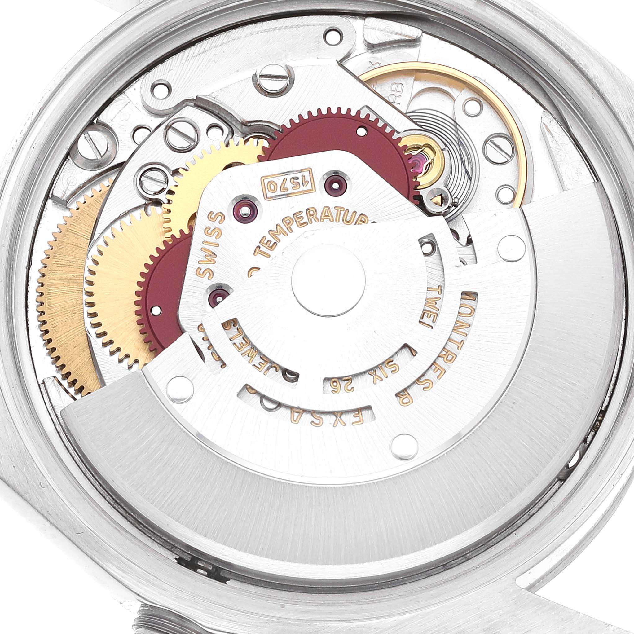 The image shows a detailed view of the movement mechanism of the Rolex Date 1500 Men's Stainless Steel Silver Dial 1500 Men's Stainless Steel Silver Dial model watch.