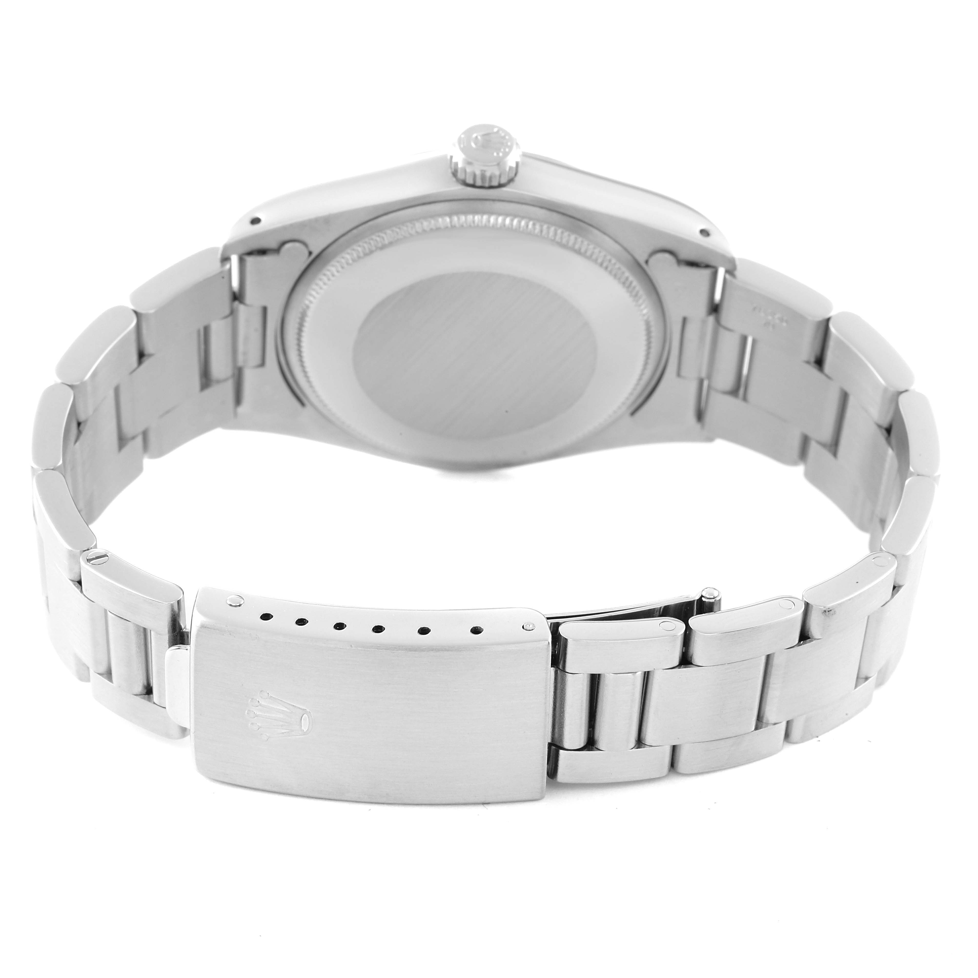 This image shows the back view, including the case, crown, and bracelet, of a Rolex Date 1500 Men's Stainless Steel Silver Dial 1500 Men's Stainless Steel Silver Dial watch.