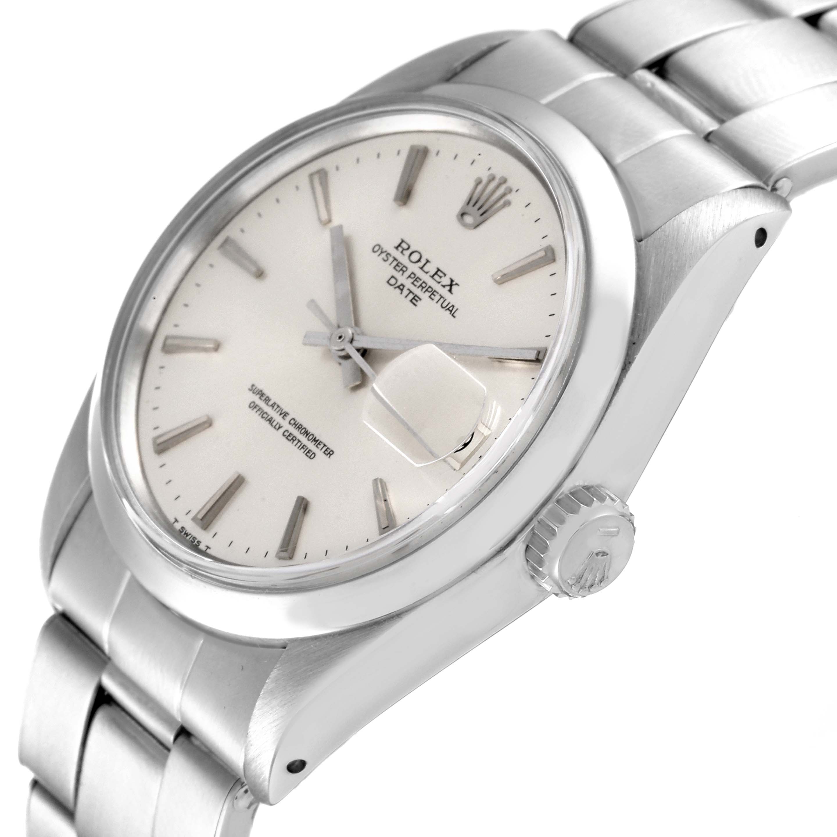 The image shows a Rolex Date 1500 Men's Stainless Steel Silver Dial 1500 Men's Stainless Steel Silver Dial model watch at an angle highlighting the face, crown, and part of the bracelet.