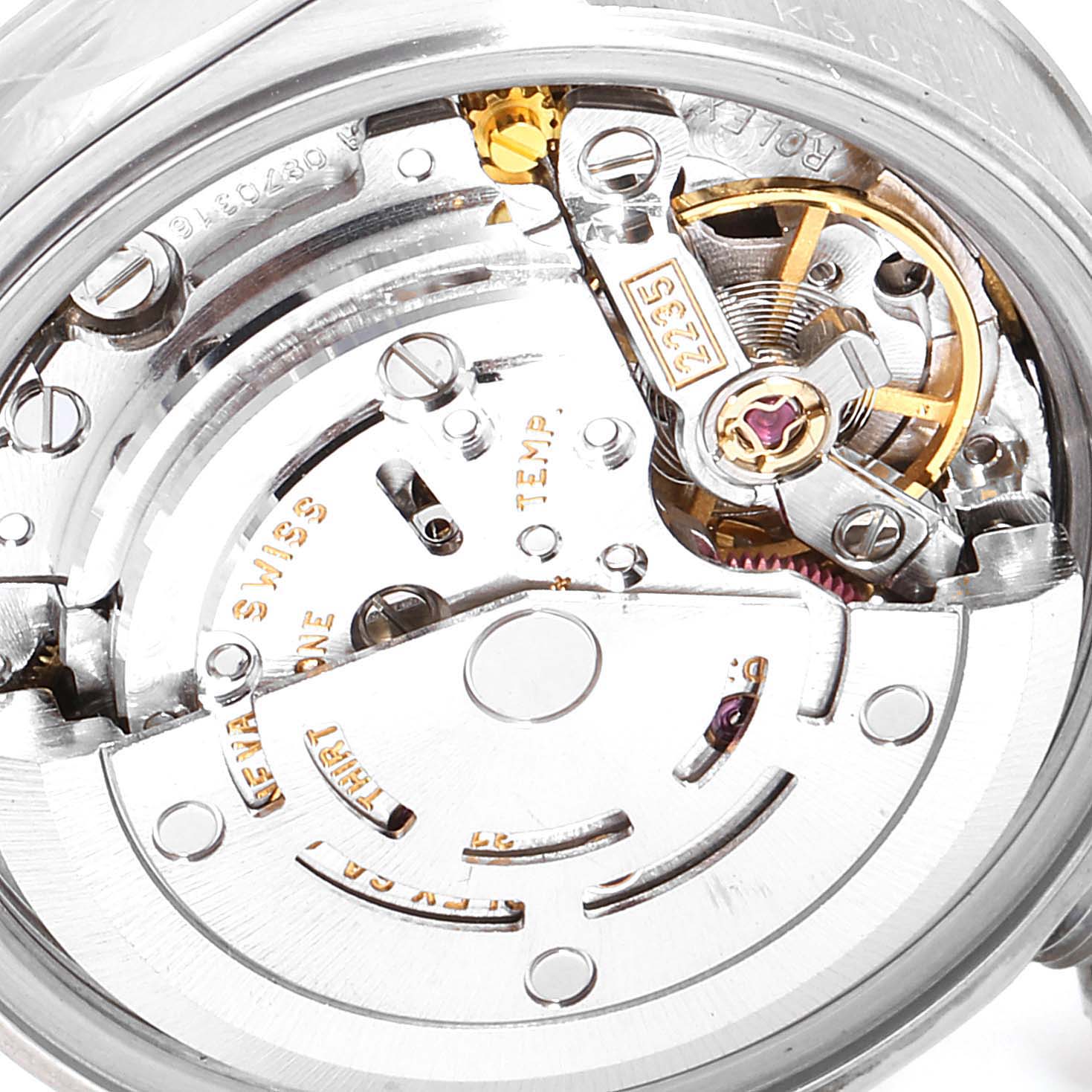 This close-up image shows the intricate inner mechanism and parts of a Rolex Date 79190 Women
s Stainless Steel White Dial 79190 Women
s Stainless Steel White Dial model watch.