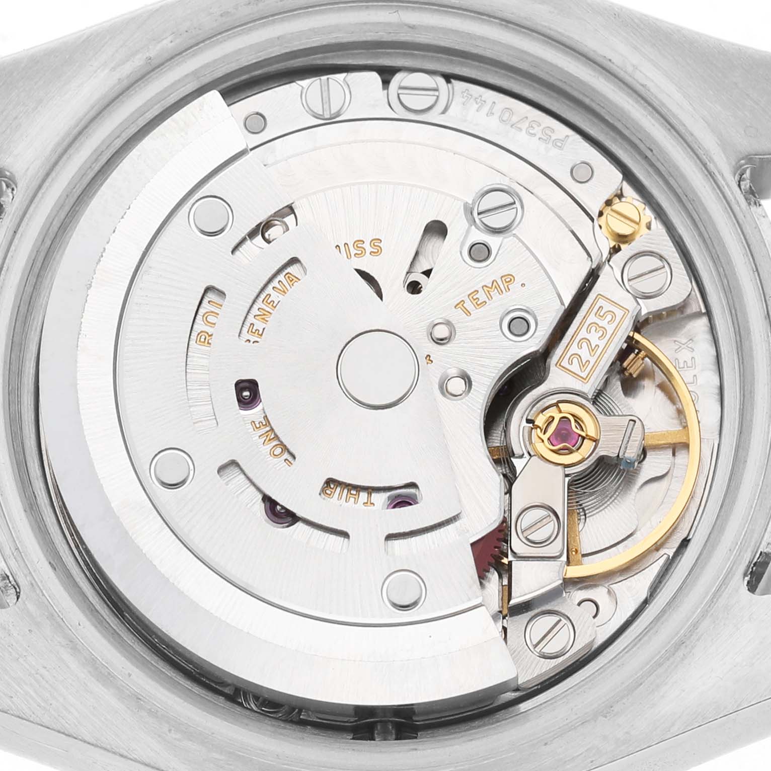 The image shows the movement of a Rolex Datejust 179384 Women's Stainless Steel Pink Dial watch from the back, highlighting the rotor and mechanical components.