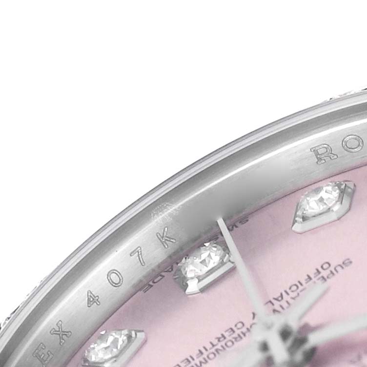 The image shows a close-up of the dial edge and bezel of a Rolex Datejust 179384 Women's Stainless Steel Pink Dial watch, highlighting the diamond markers and part of the pink dial.
