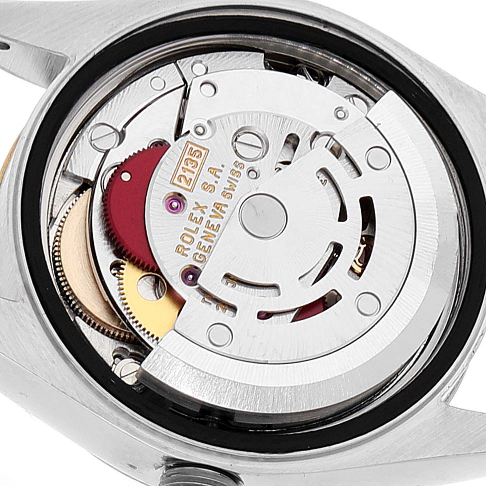 The image shows the inner mechanical movement of a Rolex Datejust 69173 Women
s Steel and Gold (two tone) Champagne Dial 69173 Women
s Steel and Gold (two tone) Champagne Dial watch at a close-up angle.