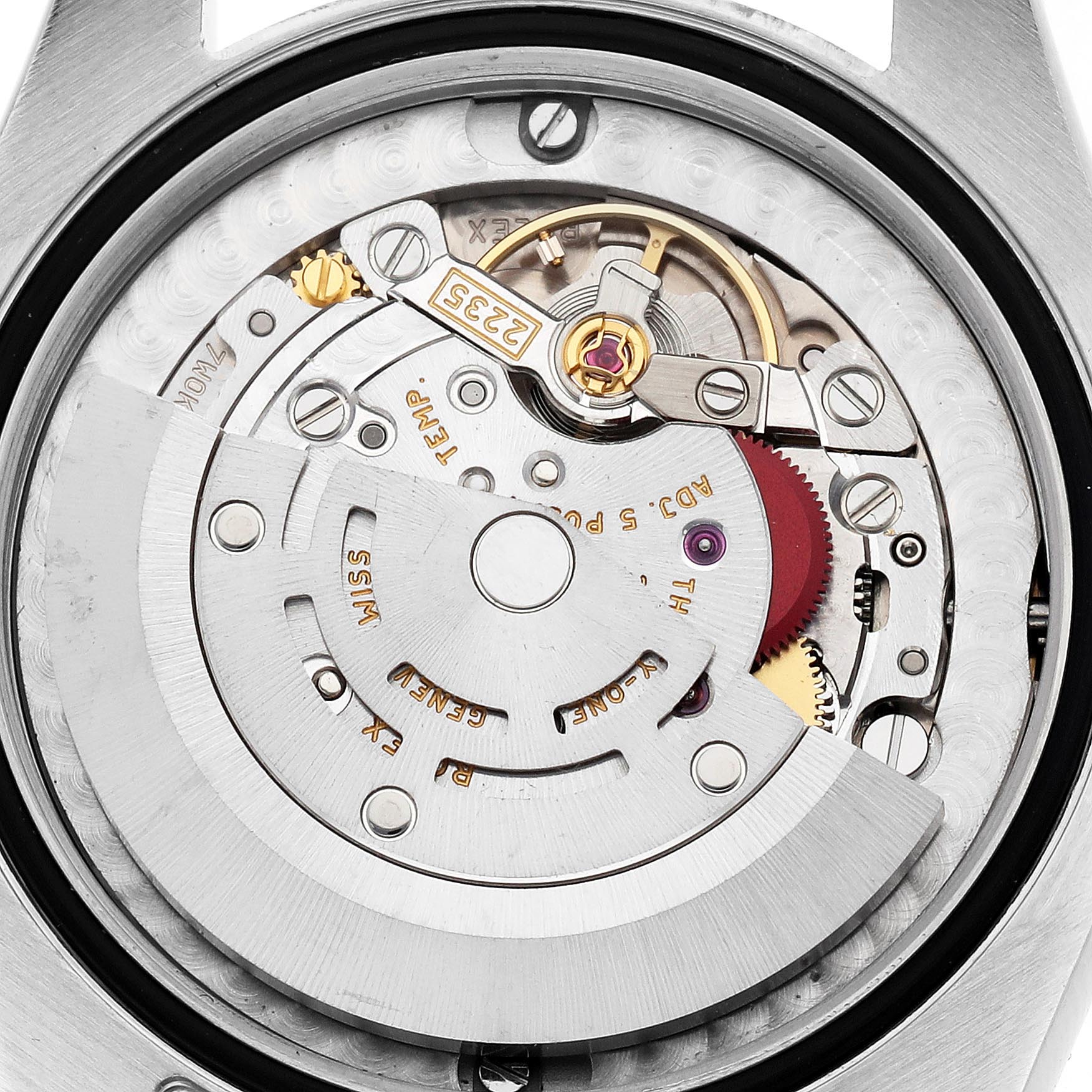 The image shows the Rolex Mid-Size 178241 Women's Steel and Gold (two tone) Mother of Pearl Dial 178241 Women's Steel and Gold (two tone) Mother of Pearl Dial watch's movement from the back, highlighting its gears and rotor.