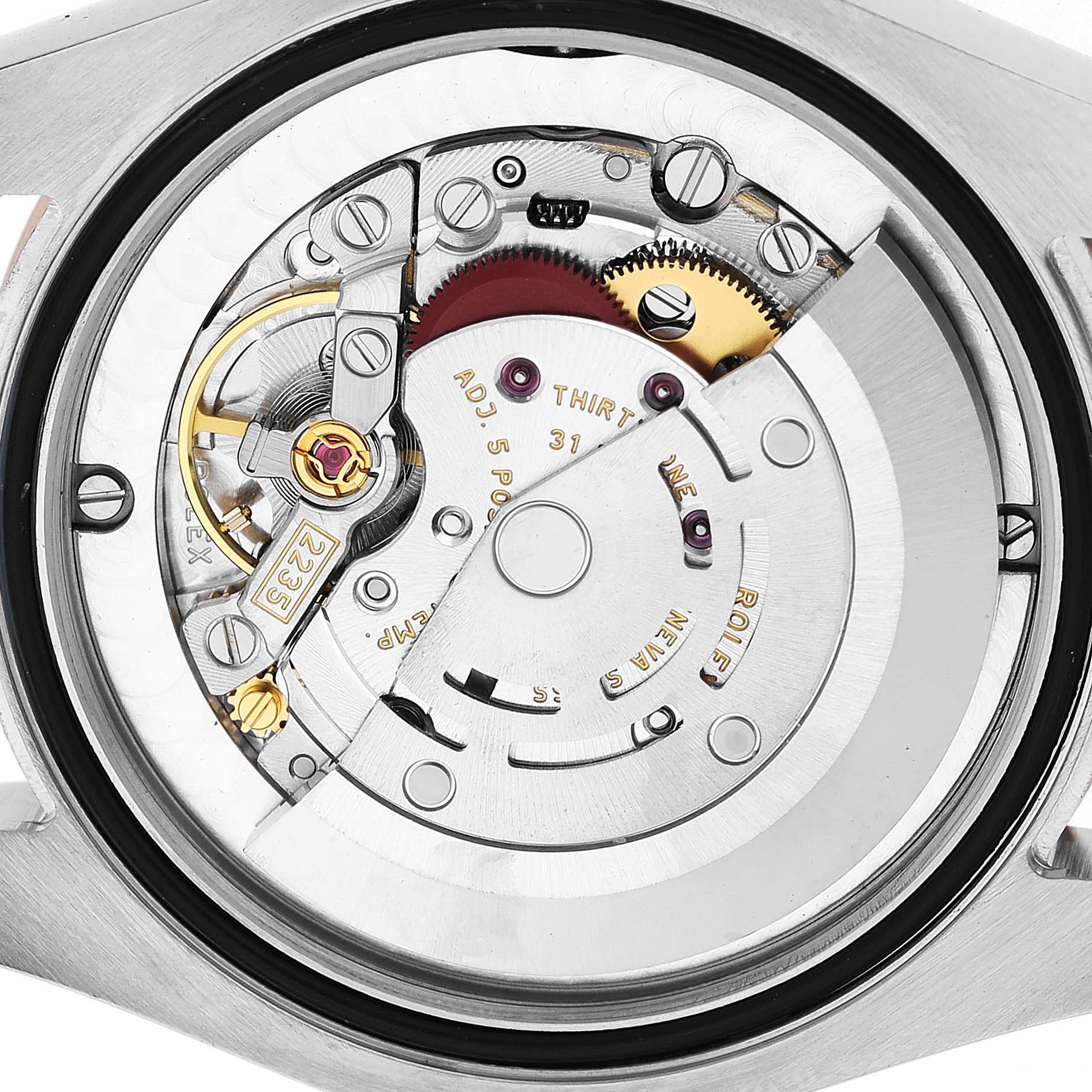 The image shows the rear view of the Rolex Mid-Size 178271 Women's Stainless Steel Brown Dial model, highlighting its internal mechanical movement.