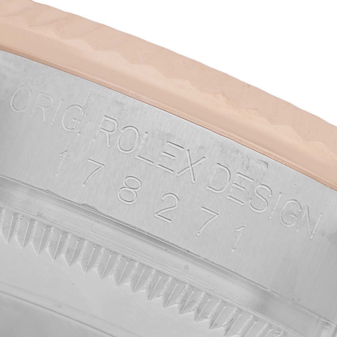 The image shows a close-up of the bezel and engraved design number of a Rolex Mid-Size 178271 Women's Stainless Steel Brown Dial watch.