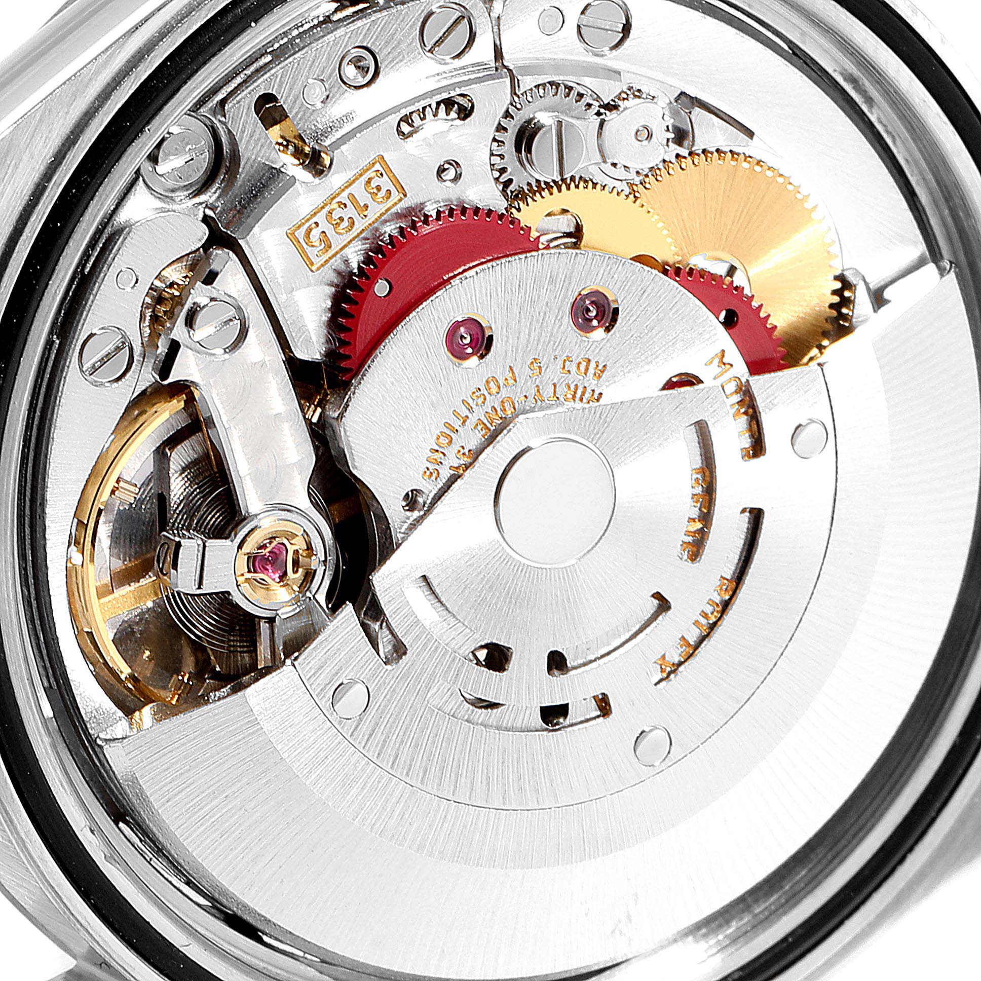 This image shows the intricate internal mechanism of a Rolex Datejust 16234 Men
s Stainless Steel Pink Dial 16234 Men
s Stainless Steel Pink Dial watch, focusing on the gears and movement parts.