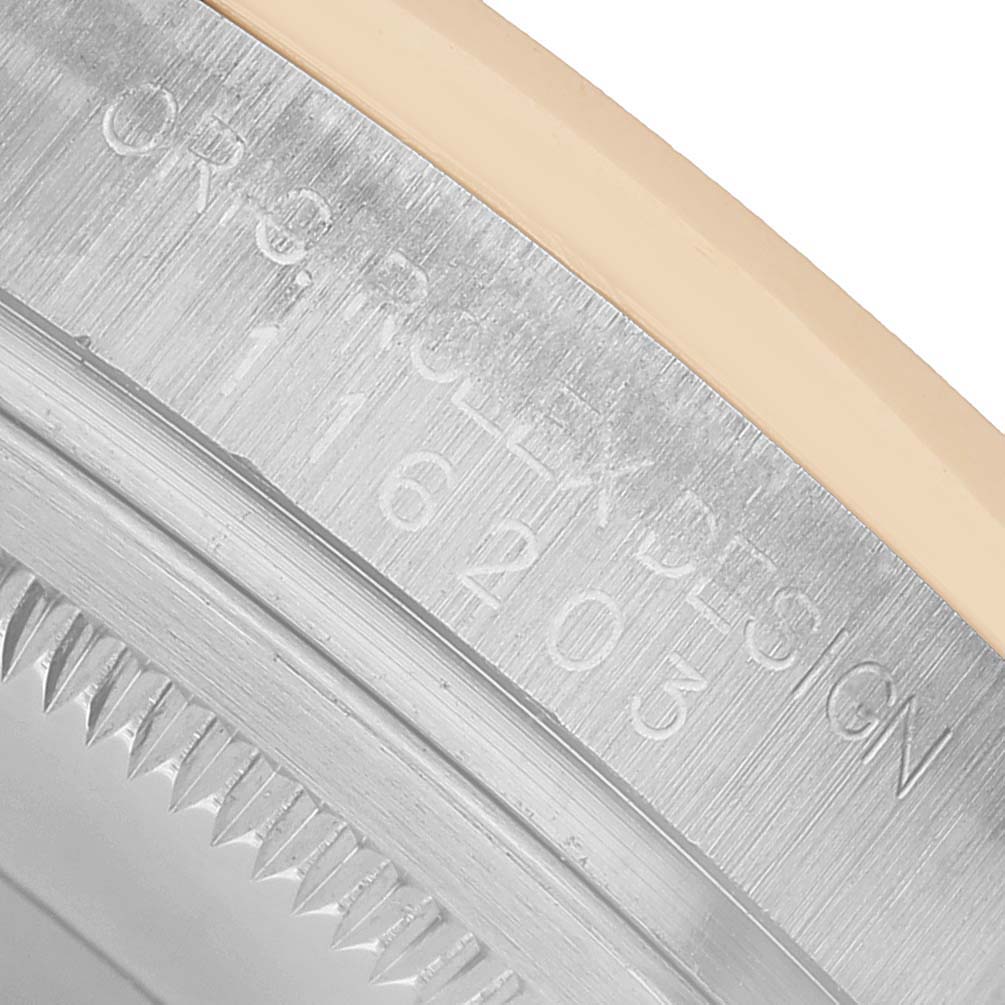 The image shows a close-up of the engraved case side of a Rolex Datejust 116233 Men's Stainless Steel Champagne Dial watch, highlighting the serial number and branding.