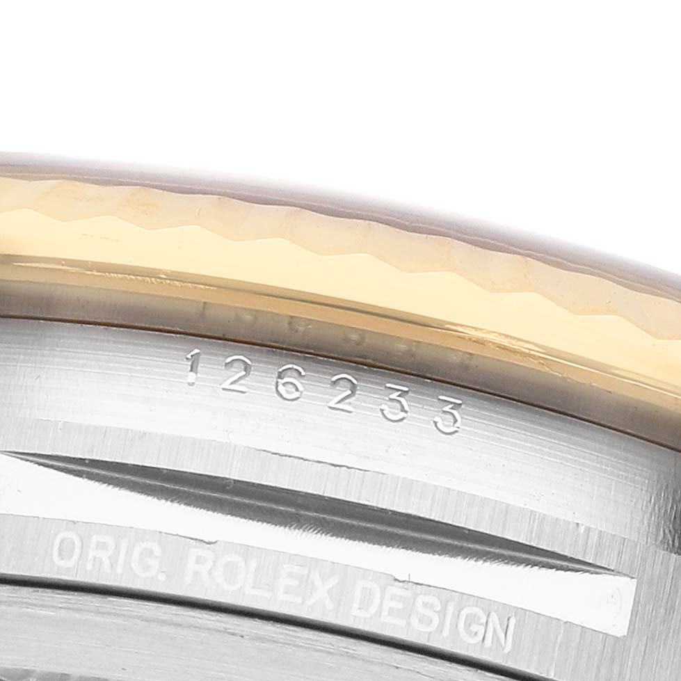 The image shows a close-up of the side of a Rolex Datejust 126233 Men's Stainless Steel Champagne Dial watch case, highlighting the model number and 'ORIG. ROLEX DESIGN' engraving.
