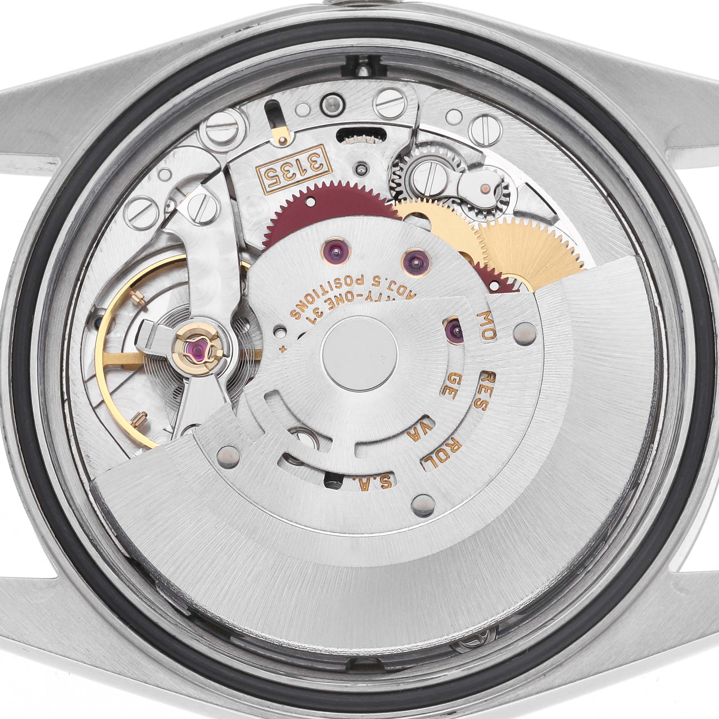 The image shows the internal mechanism of a Rolex Datejust 16234 Men's Stainless Steel White Dial 16234 Men's Stainless Steel White Dial watch, viewed from the back, highlighting gears and components.