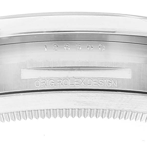 This is a close-up of the side of the Rolex Datejust 41 126300 Men's Stainless Steel Blue Dial 126300 Men's Stainless Steel Blue Dial watch, showing the model number and "ORIG. ROLEX DESIGN" engraving.