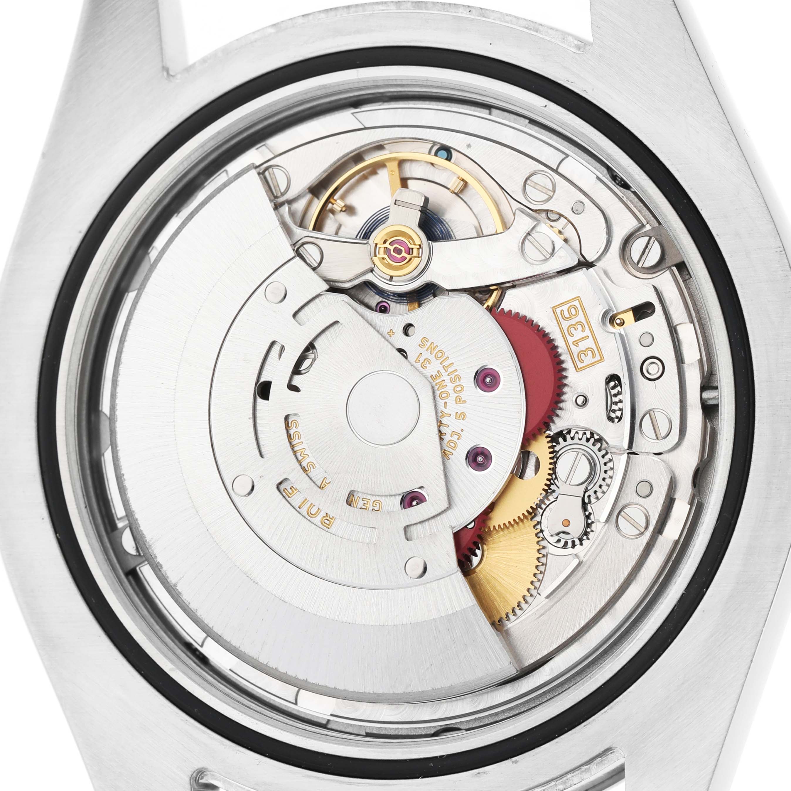 The image shows the movement mechanism of the Rolex Datejust 41 116334 Men's Stainless Steel Blue Dial, viewed from the back, highlighting gears and components.