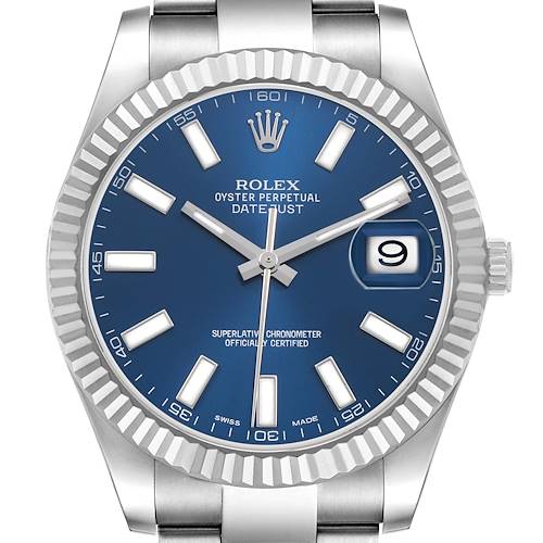 The image shows a Rolex Datejust 41 116334 Men's Stainless Steel Blue Dial watch from a front angle, highlighting its blue dial, fluted bezel, and silver hands.