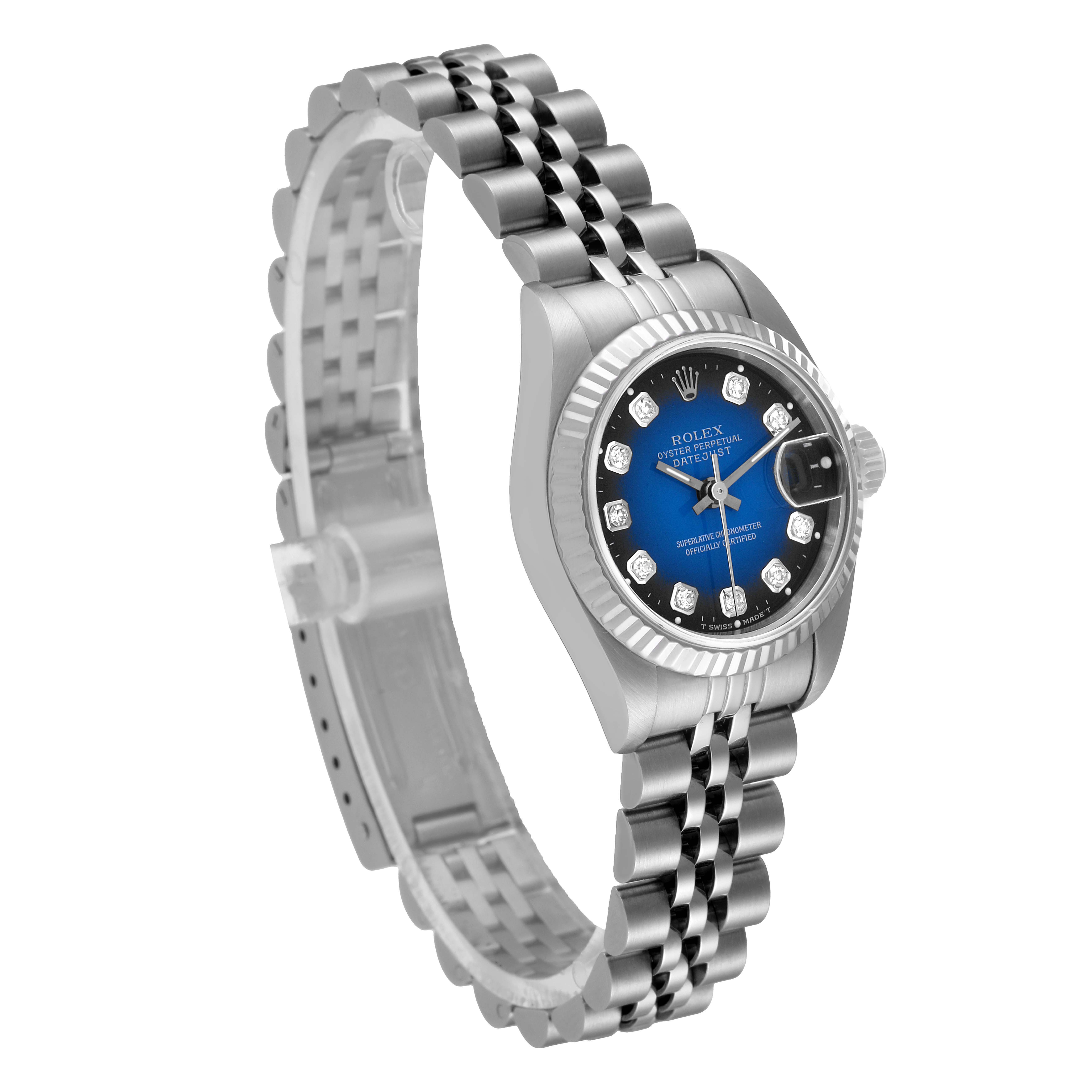 This Rolex Datejust 69174 Women
s Stainless Steel Blue Dial 69174 Women
s Stainless Steel Blue Dial watch is shown at an angled view highlighting its face, bezel, and bracelet.