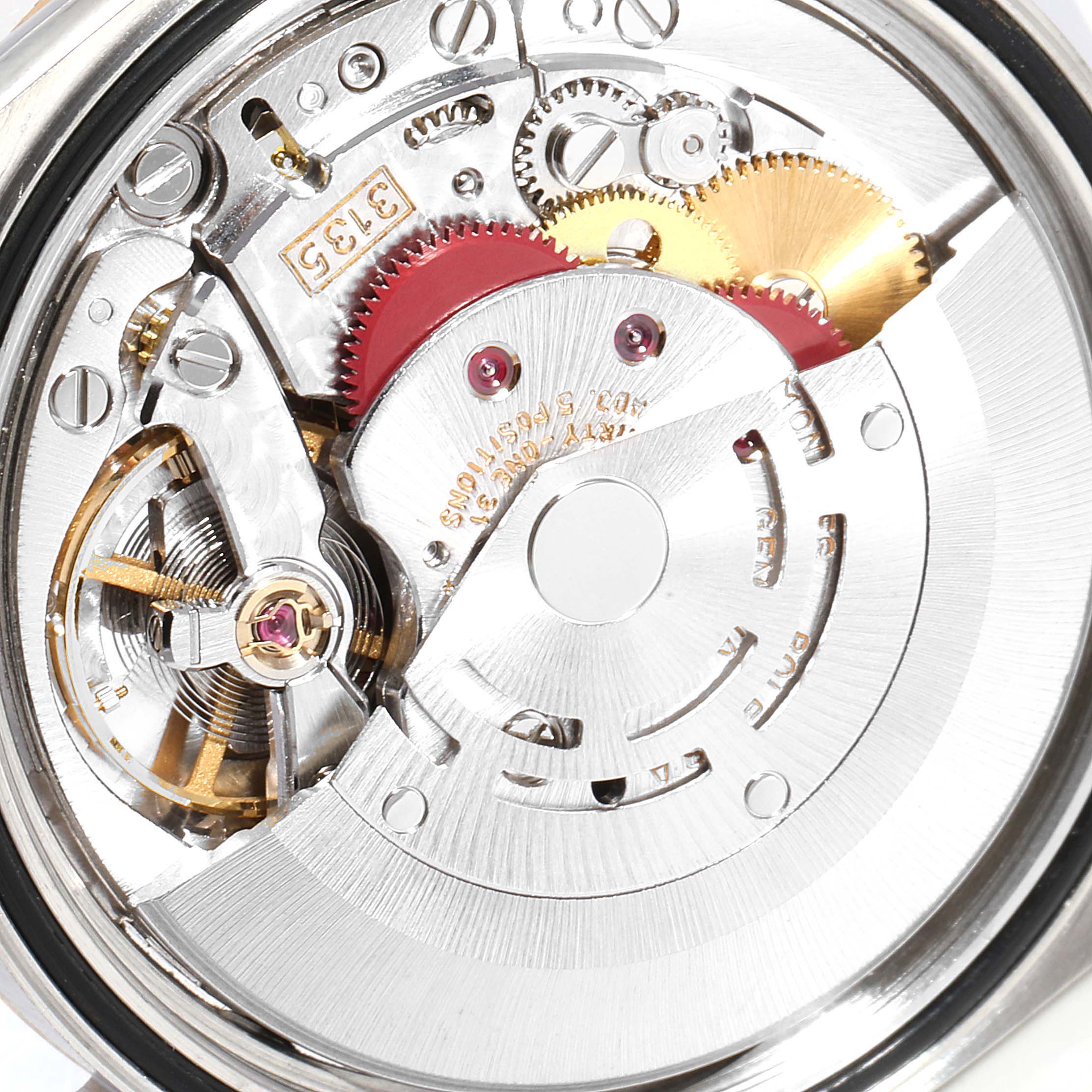 The image shows the internal movement components of the Rolex Datejust 16233 Men
s Steel and Gold (two tone) Champagne Dial 16233 Men
s Steel and Gold (two tone) Champagne Dial model from a macro angle.