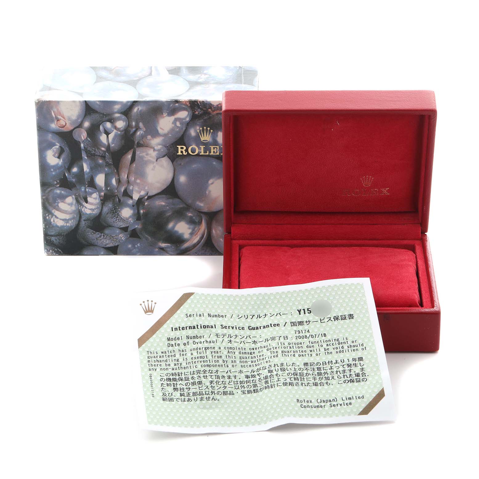 The image shows a Rolex Datejust 79174 Women
s Stainless Steel Blue Dial 79174 Women
s Stainless Steel Blue Dial watch box at an angle, with an open red interior and a visible international service guarantee card.