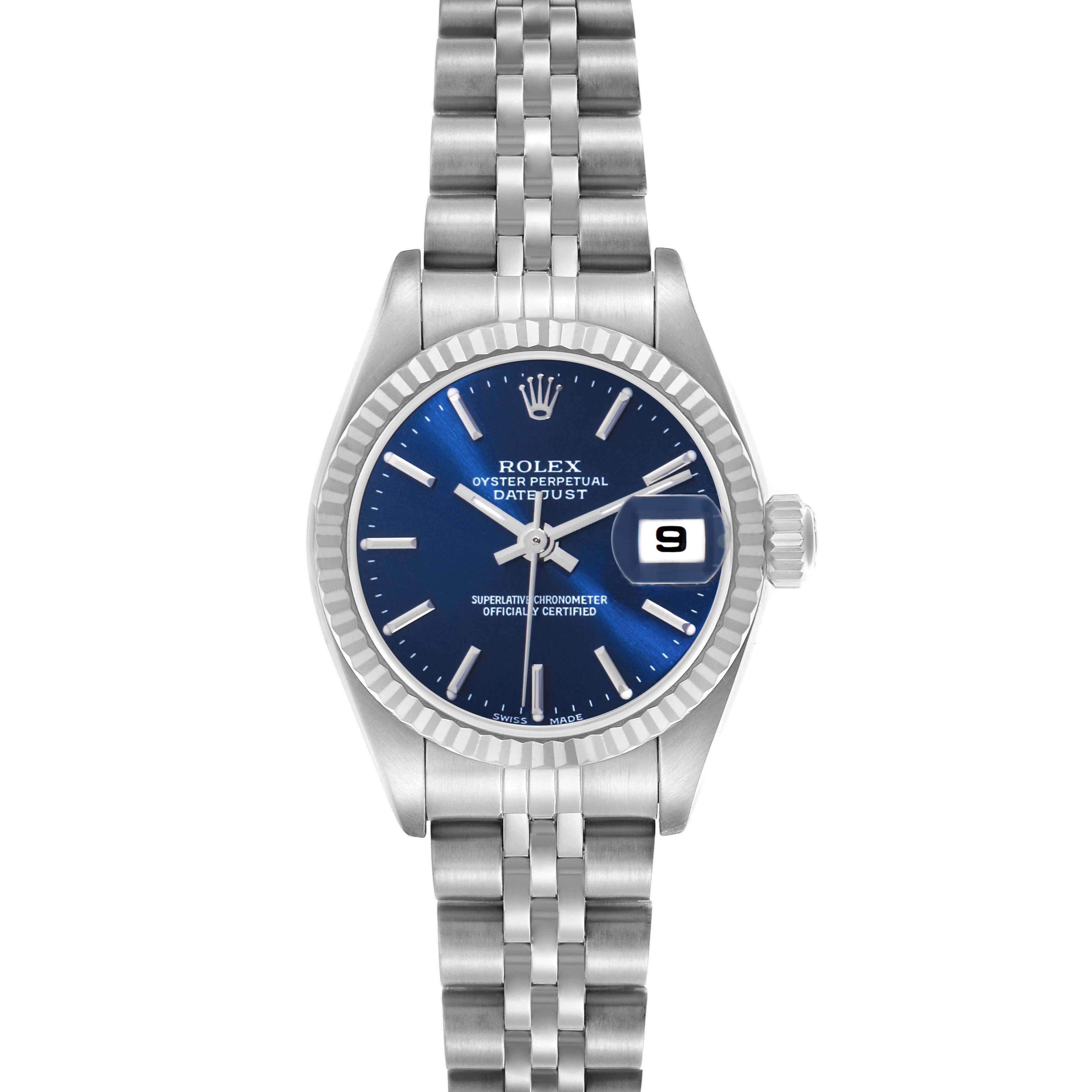 The image shows a front view of a Rolex Datejust 79174 Women
s Stainless Steel Blue Dial 79174 Women
s Stainless Steel Blue Dial watch, displaying its blue dial, fluted bezel, and Jubilee bracelet.