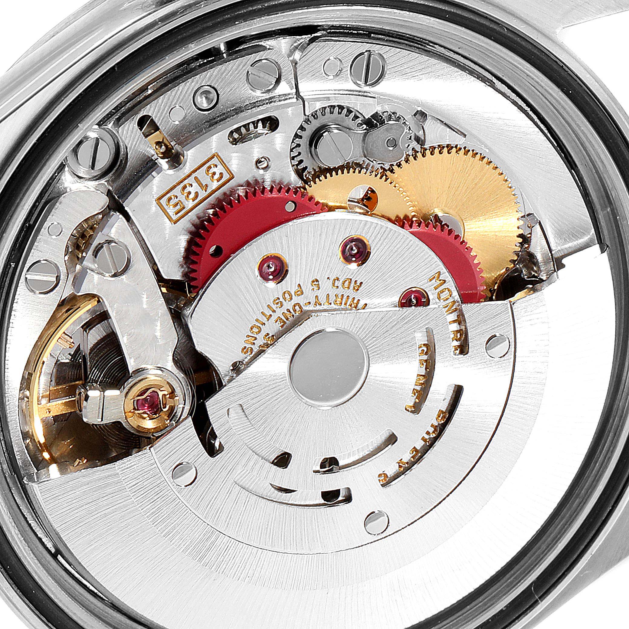 This image shows the intricate inner movement components of a Rolex Datejust 16234 Men
s Stainless Steel Blue Dial 16234 Men
s Stainless Steel Blue Dial watch from a close-up angle.