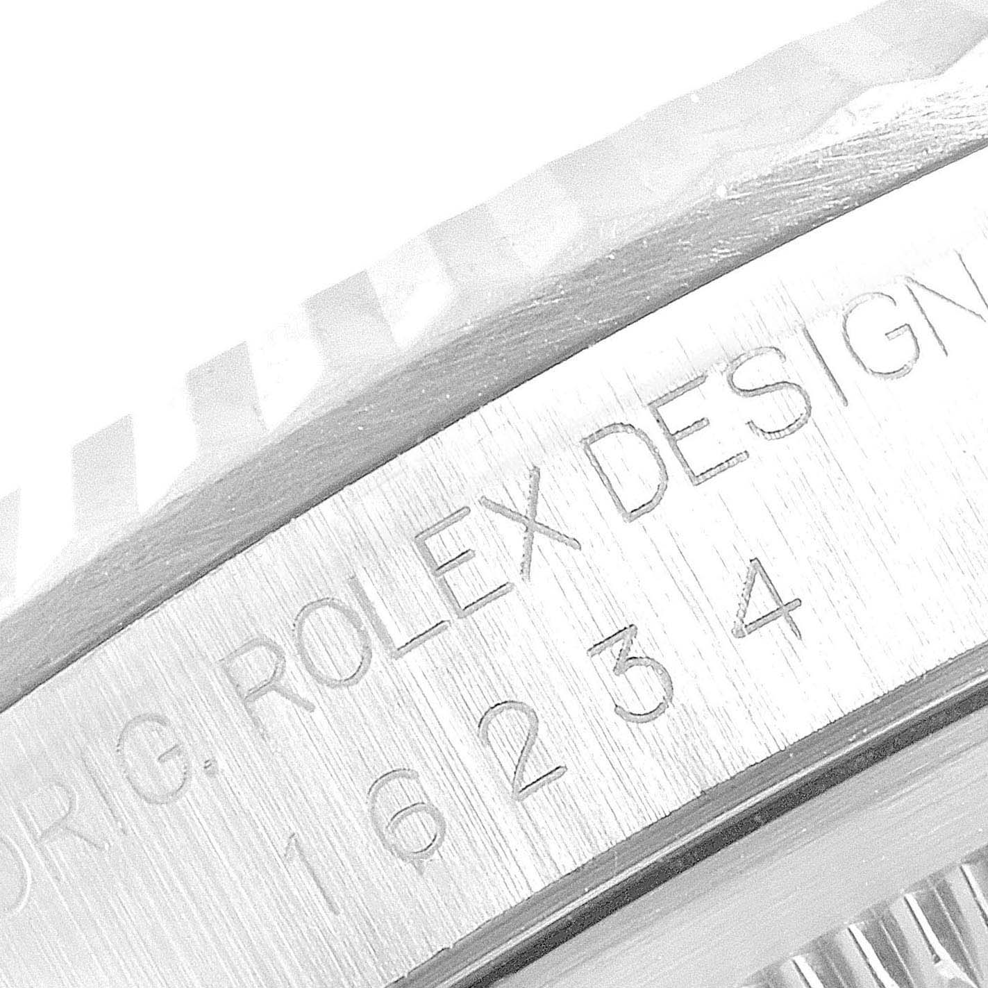 This image shows a close-up of the case side and serial number of a Rolex Datejust 16234 Men's Stainless Steel Silver Dial 16234 Men's Stainless Steel Silver Dial watch.