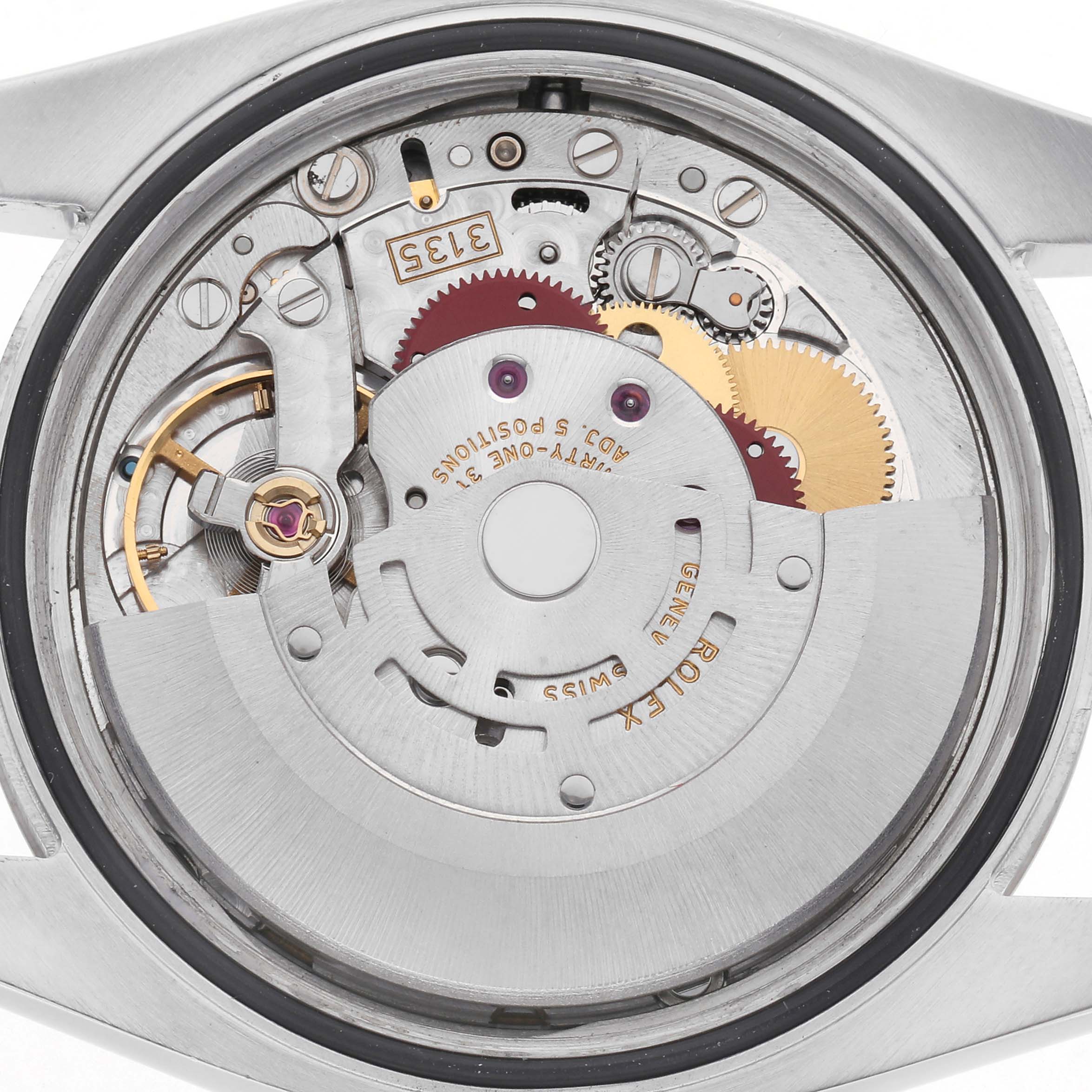 This image shows the movement of a Rolex Datejust 116234 Men's Stainless Steel White Dial 116234 Men's Stainless Steel White Dial from a top-down angle, revealing intricate gears and components.