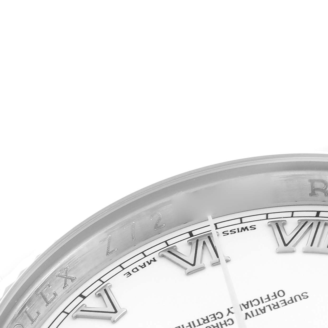 The image shows a close-up of the Rolex Datejust 116234 Men's Stainless Steel White Dial 116234 Men's Stainless Steel White Dial's dial with Roman numerals and part of the bezel.