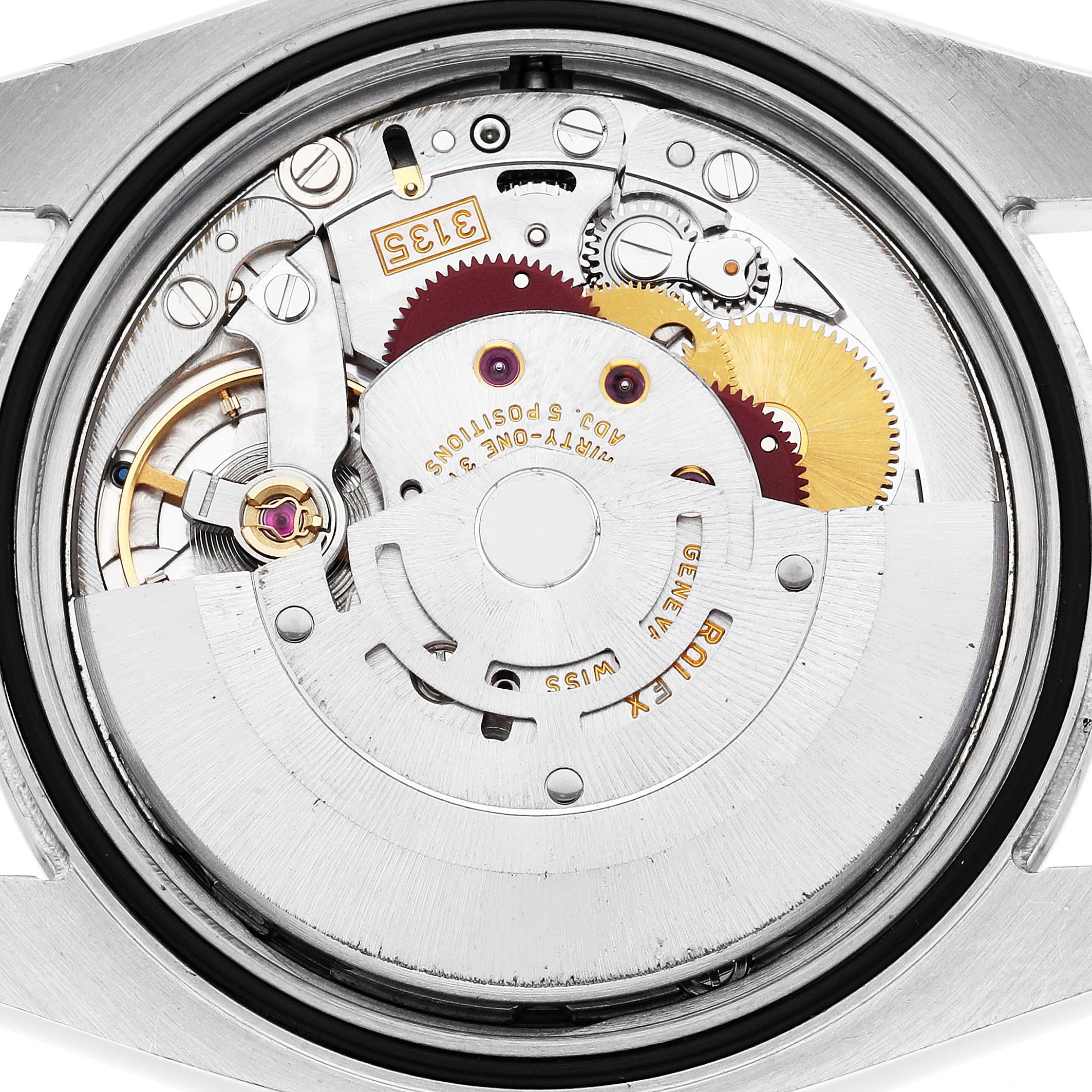 The image shows the movement of a Rolex Datejust 116233 Men's Steel and Gold (two tone) Beige Dial 116233 Men's Steel and Gold (two tone) Beige Dial watch from a back view, highlighting gears and intricate mechanical parts.
