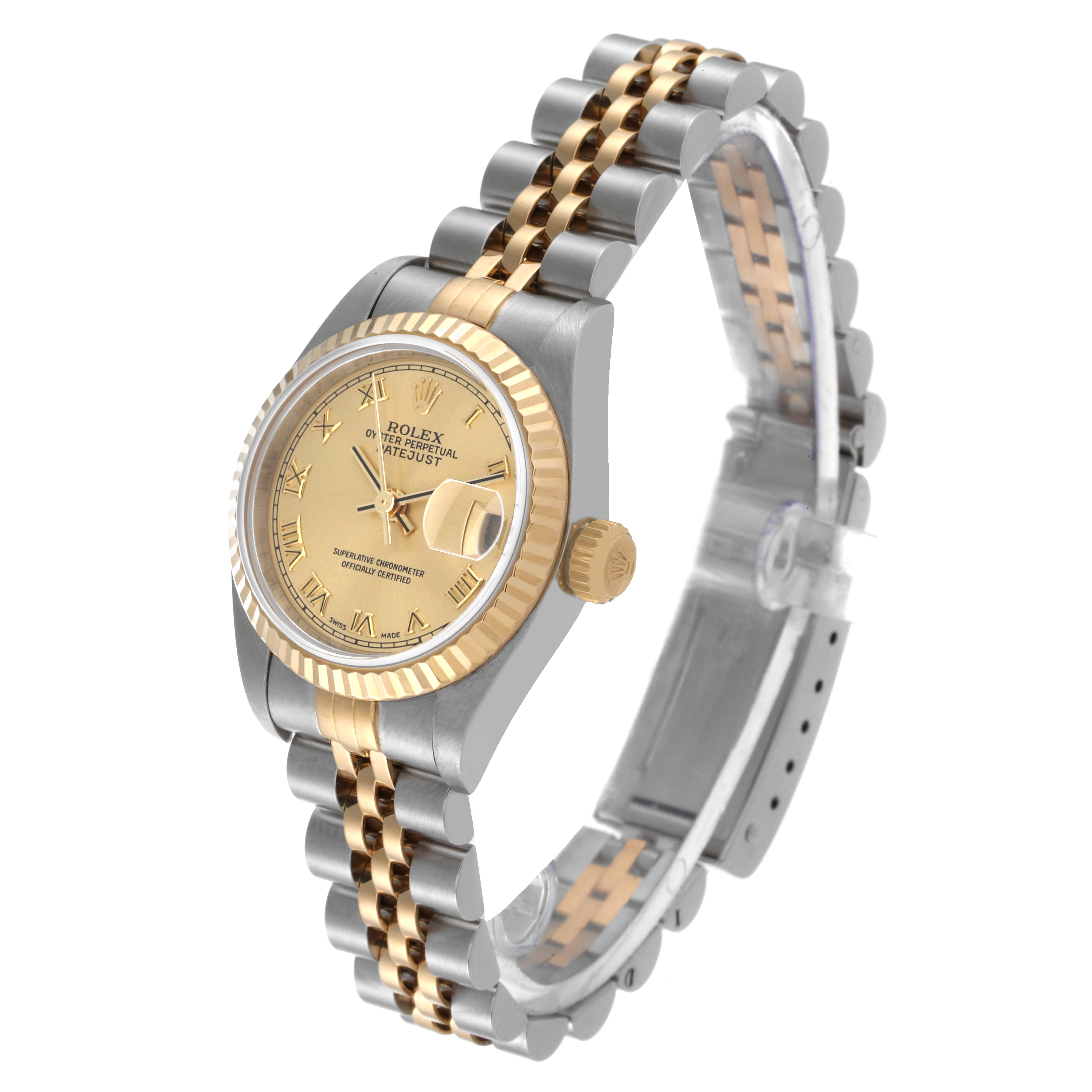 The Rolex Datejust 79173 Women's Steel and Gold (two tone) Champagne Dial 79173 Women's Steel and Gold (two tone) Champagne Dial model watch is shown at a three-quarter angle, highlighting its gold and silver bracelet and fluted bezel.