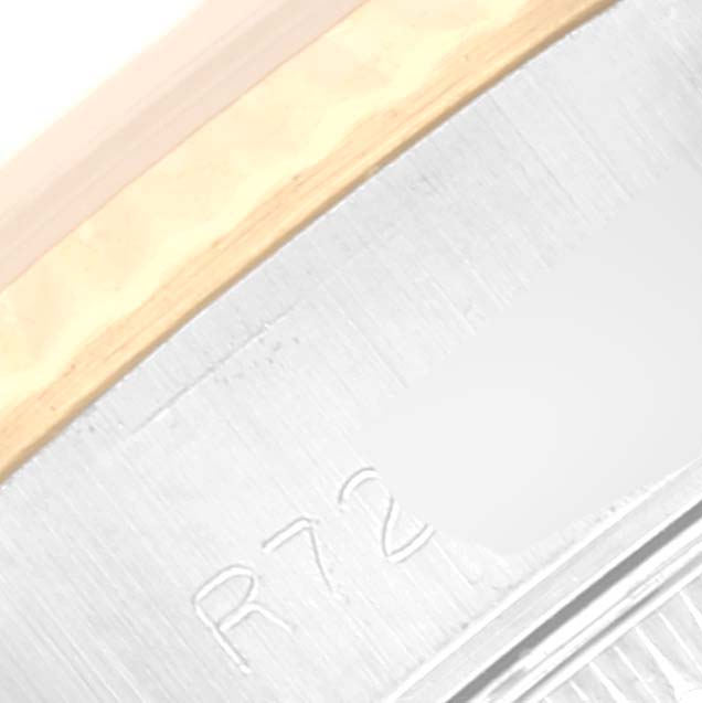 The image shows a close-up angle of the bezel and part of the outer rim of a Rolex Datejust 69173 Women's Steel and Gold (two tone) Champagne Dial 69173 Women's Steel and Gold (two tone) Champagne Dial watch.