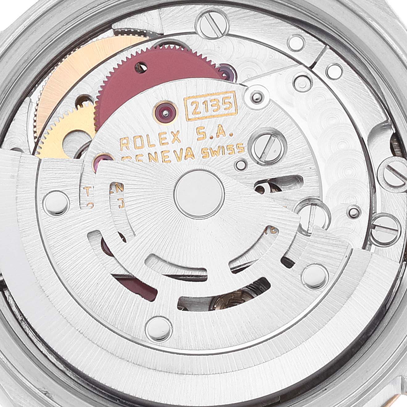 This close-up image shows the internal mechanism of a Rolex Datejust 69173 Women's Steel and Gold (two tone) Champagne Dial 69173 Women's Steel and Gold (two tone) Champagne Dial watch, highlighting its intricate gears and components.