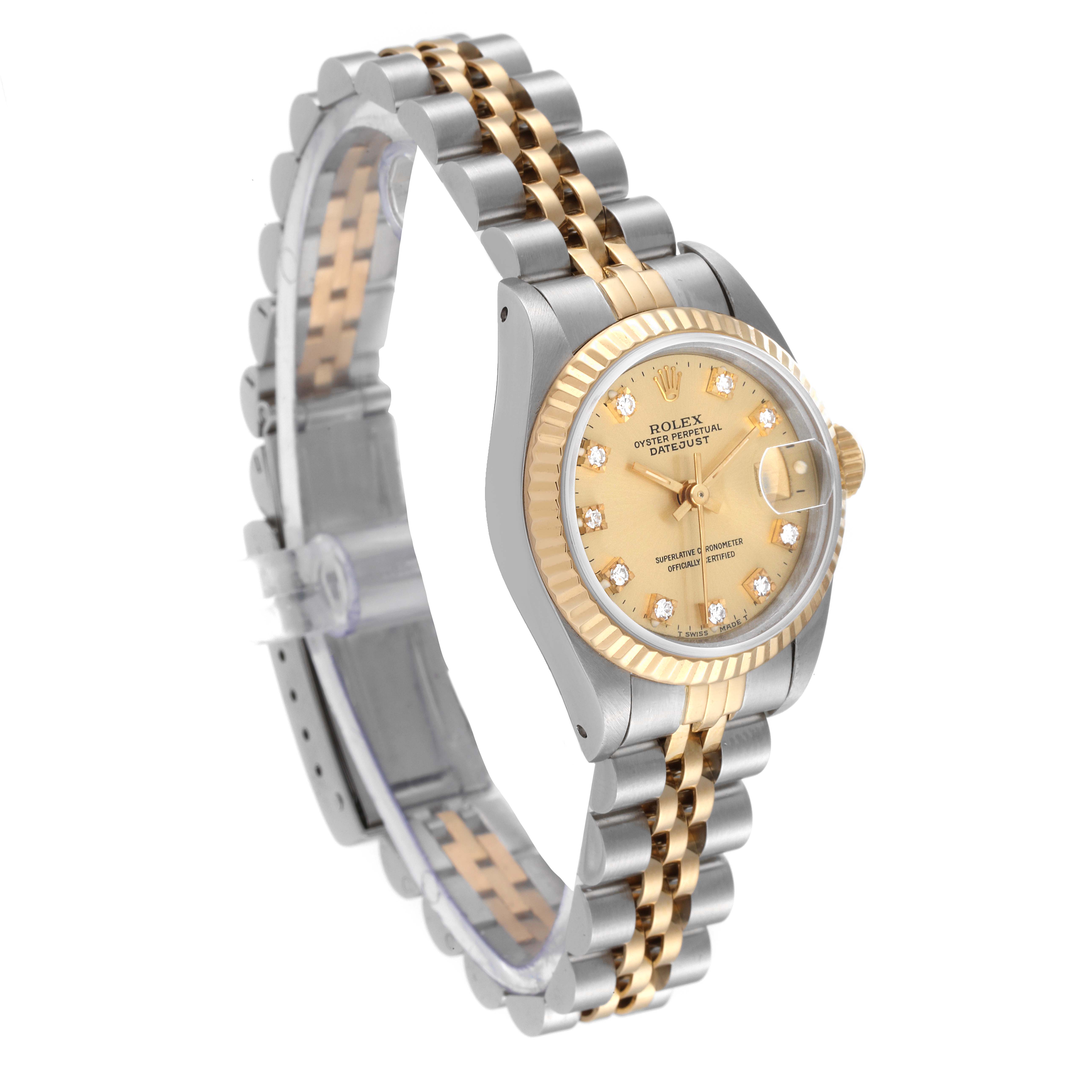 The image shows a Rolex Datejust 69173 Women's Steel and Gold (two tone) Champagne Dial 69173 Women's Steel and Gold (two tone) Champagne Dial watch from a slightly elevated side angle, highlighting its two-tone bracelet, fluted bezel, and champagne dial.