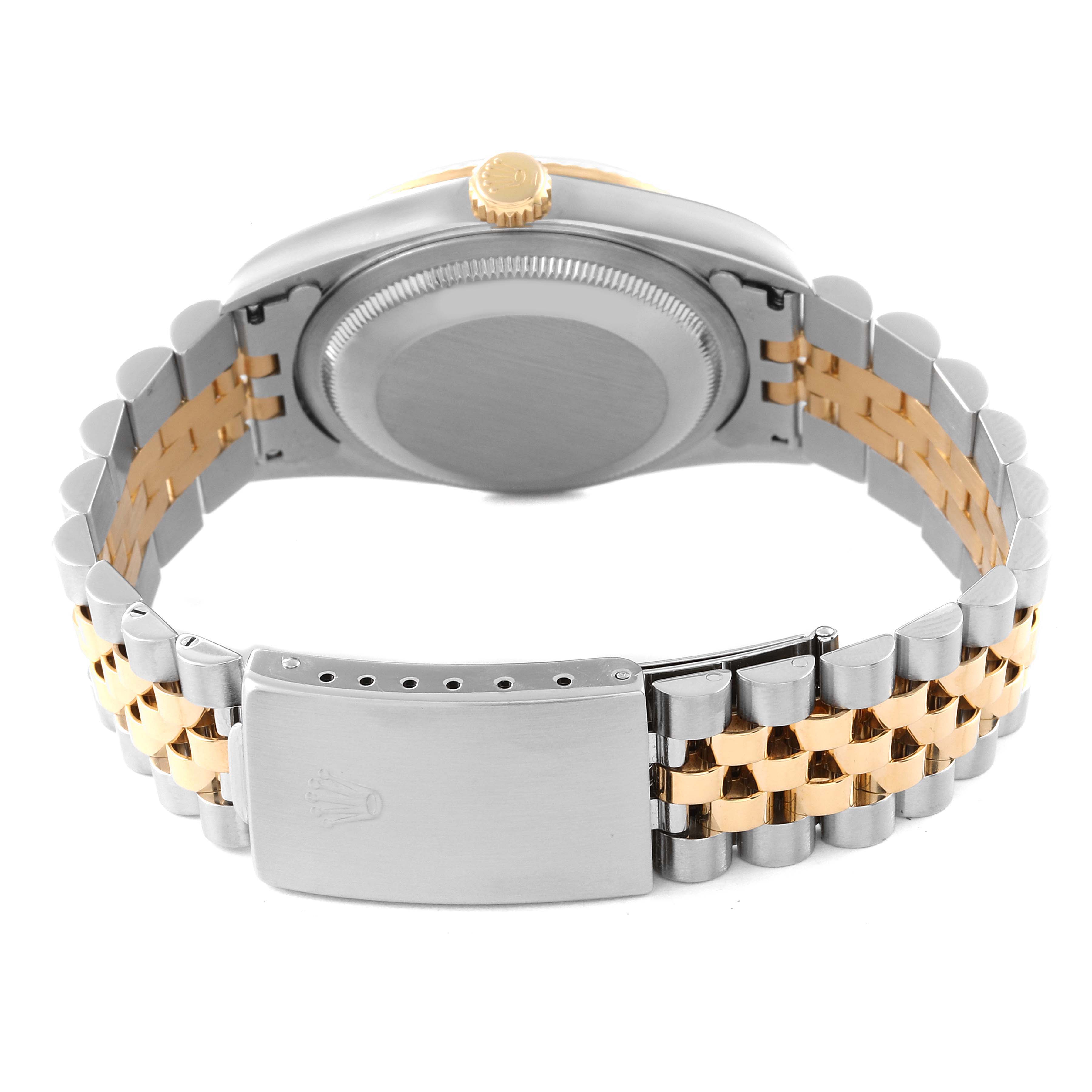 This rear view shows the bracelet, clasp, case back, and crown of the Rolex Datejust 16233 Men's Steel and Gold (two tone) Mother of Pearl Dial 16233 Men's Steel and Gold (two tone) Mother of Pearl Dial watch.