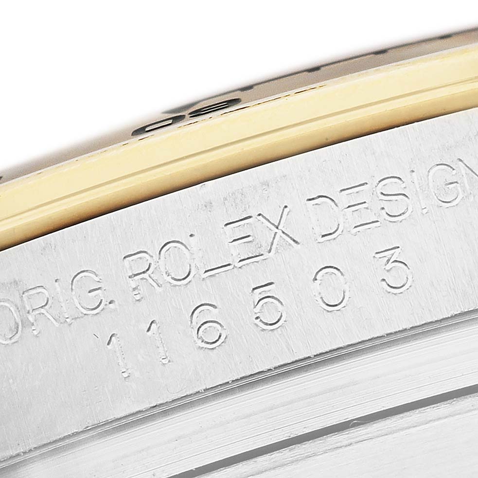 The image shows a close-up of the engraved case edge on a Rolex Daytona 116503 Men's Stainless Steel Black Dial watch, highlighting "ORIG. ROLEX DESIGN 116503."