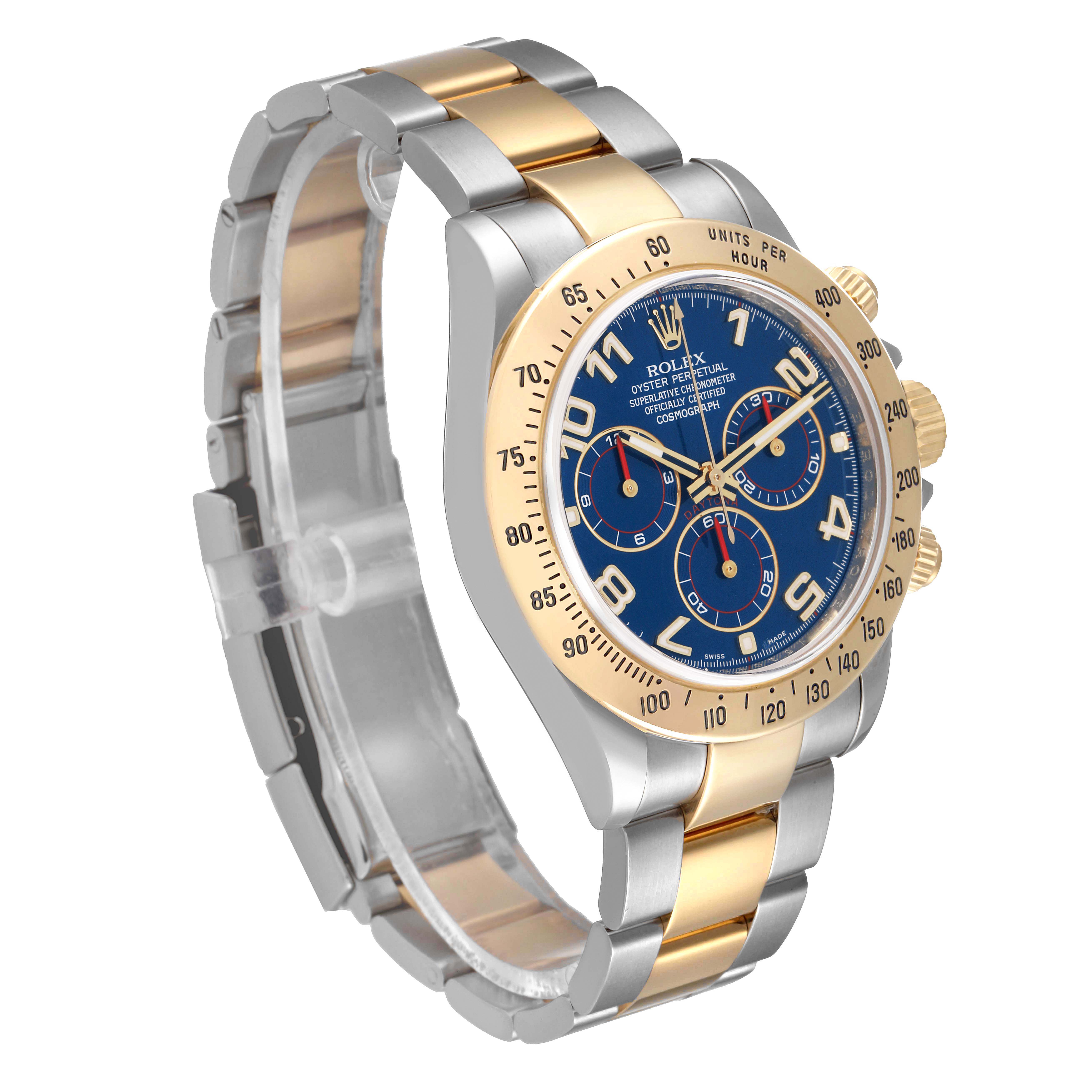This image shows a Rolex Daytona 116523 Men's Steel and Gold (two tone) Blue Dial 116523 Men's Steel and Gold (two tone) Blue Dial watch at a three-quarter angle, highlighting its gold and silver bracelet and blue dial.