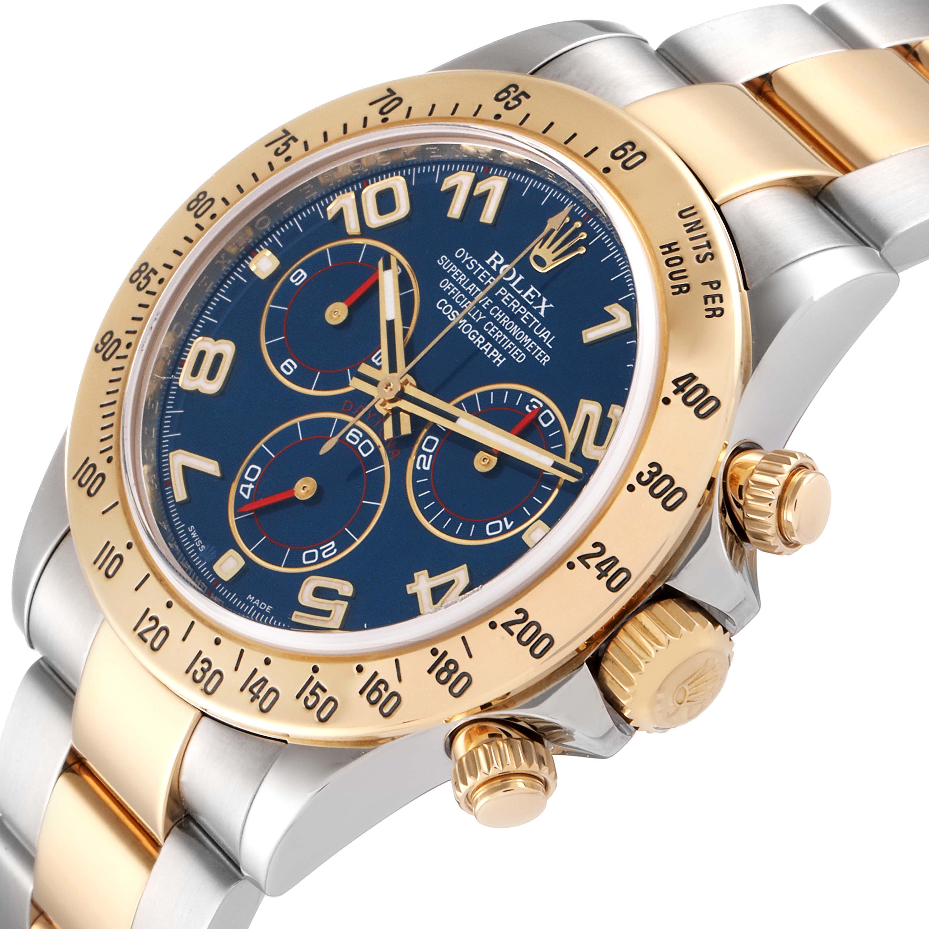 This image shows a close-up angle of the Rolex Daytona 116523 Men's Steel and Gold (two tone) Blue Dial 116523 Men's Steel and Gold (two tone) Blue Dial watch, highlighting its bezel, crown, and part of the bracelet.
