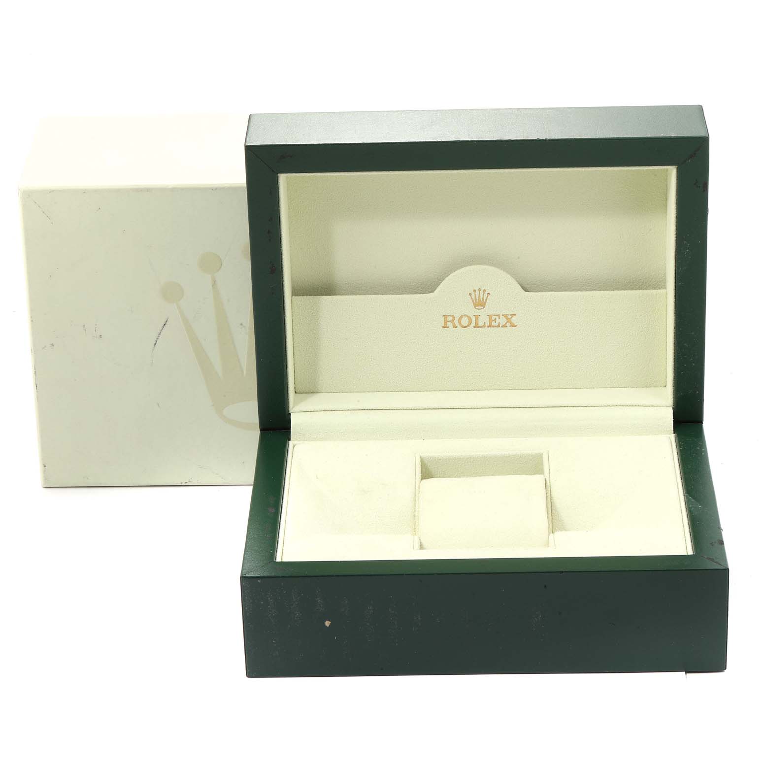 The image shows an open Rolex Daytona 116520 Men's Stainless Steel White Dial 116520 Men's Stainless Steel White Dial watch box, highlighting its interior with the brand's logo and cushion for the watch.