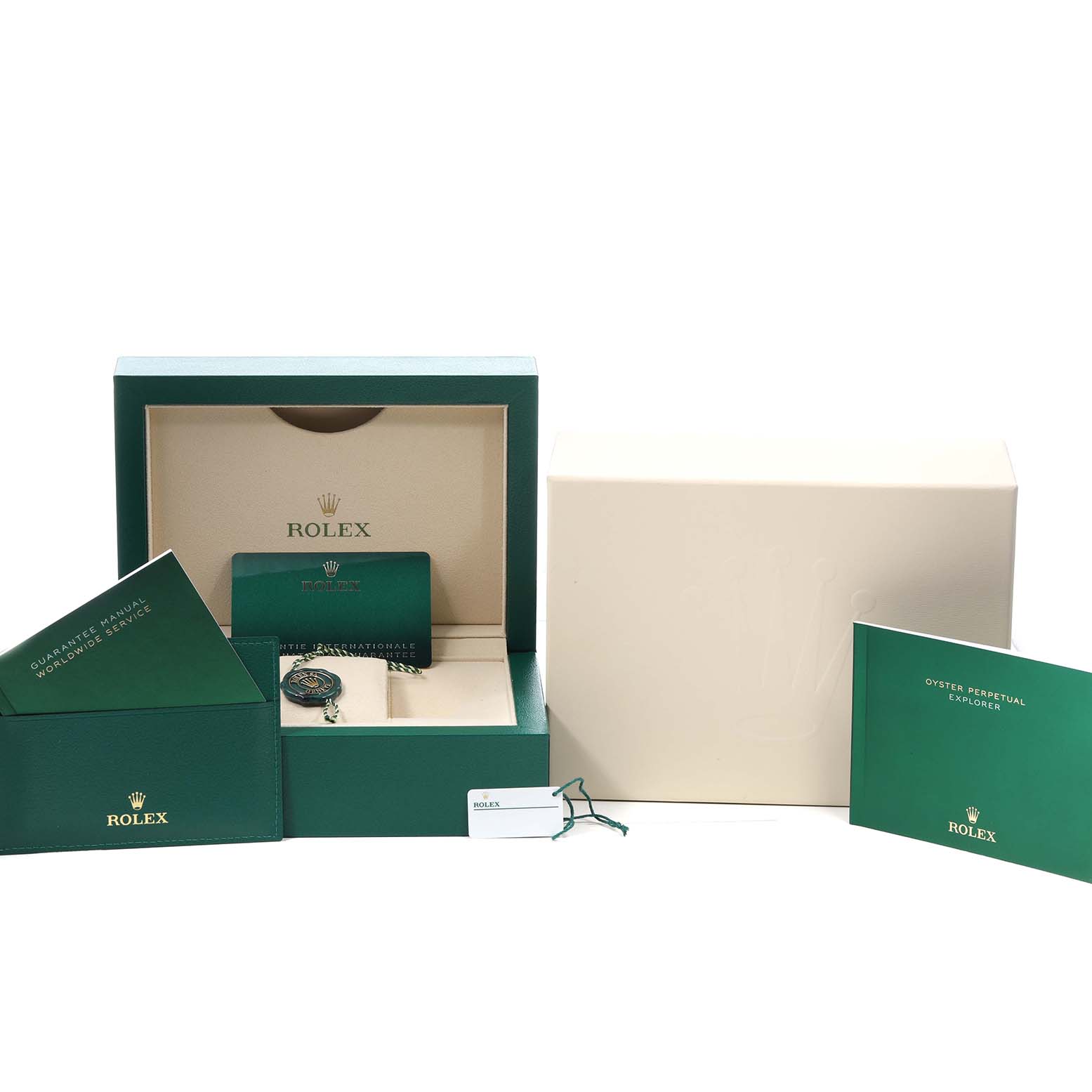 The Rolex Explorer M214270-0003 Men's Stainless Steel Black Dial watch is shown from a frontal angle with its box, booklet, and warranty card.