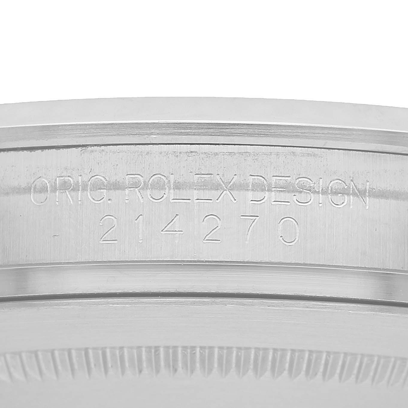 The image shows an angled close-up of the side of a Rolex Explorer M214270-0003 Men's Stainless Steel Black Dial model, displaying the engraved design number "214270".