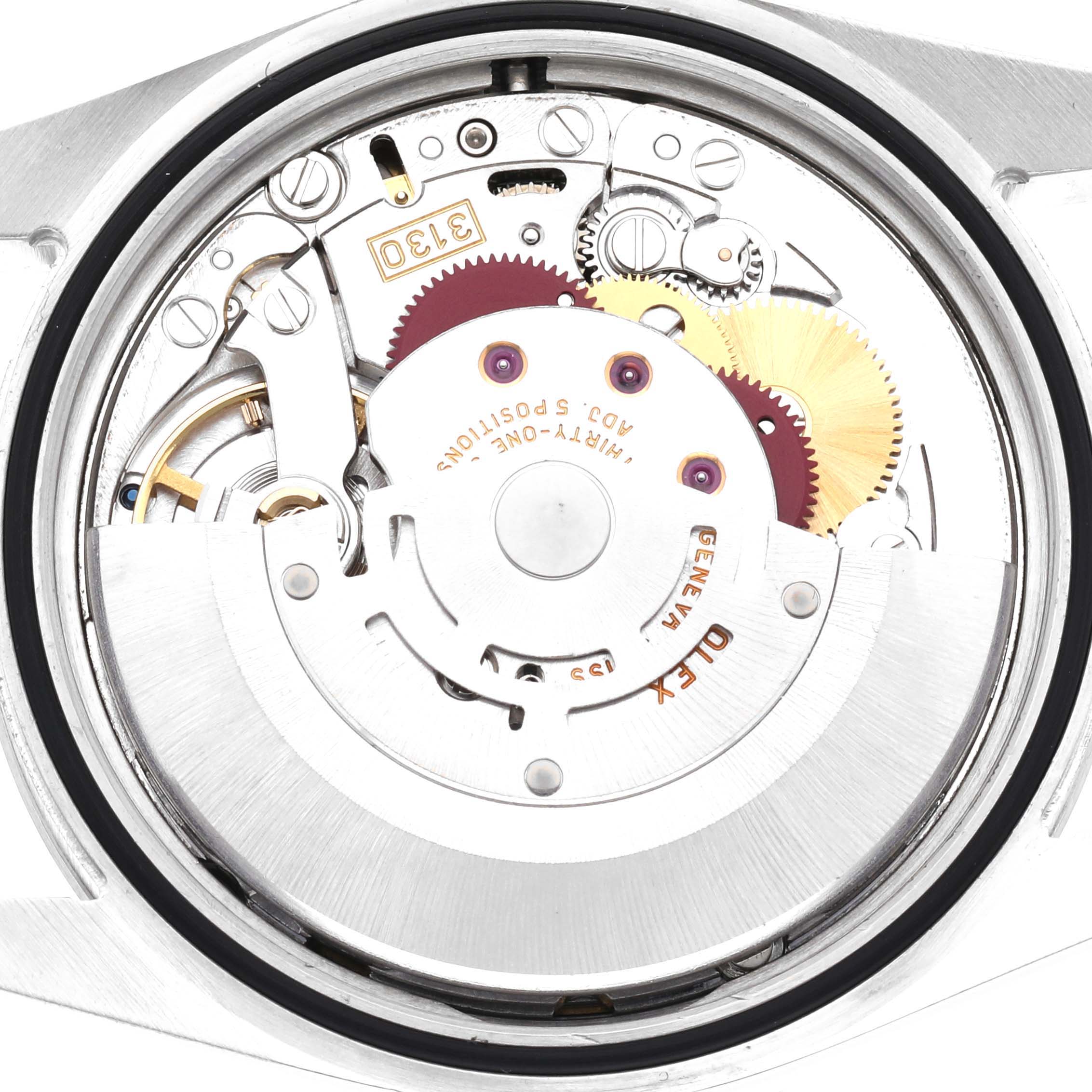 The image shows the internal mechanism of a Rolex Explorer 114270 Men's Stainless Steel Black Dial 114270 Men's Stainless Steel Black Dial watch, viewed from the back case angle, revealing gears and movement components.