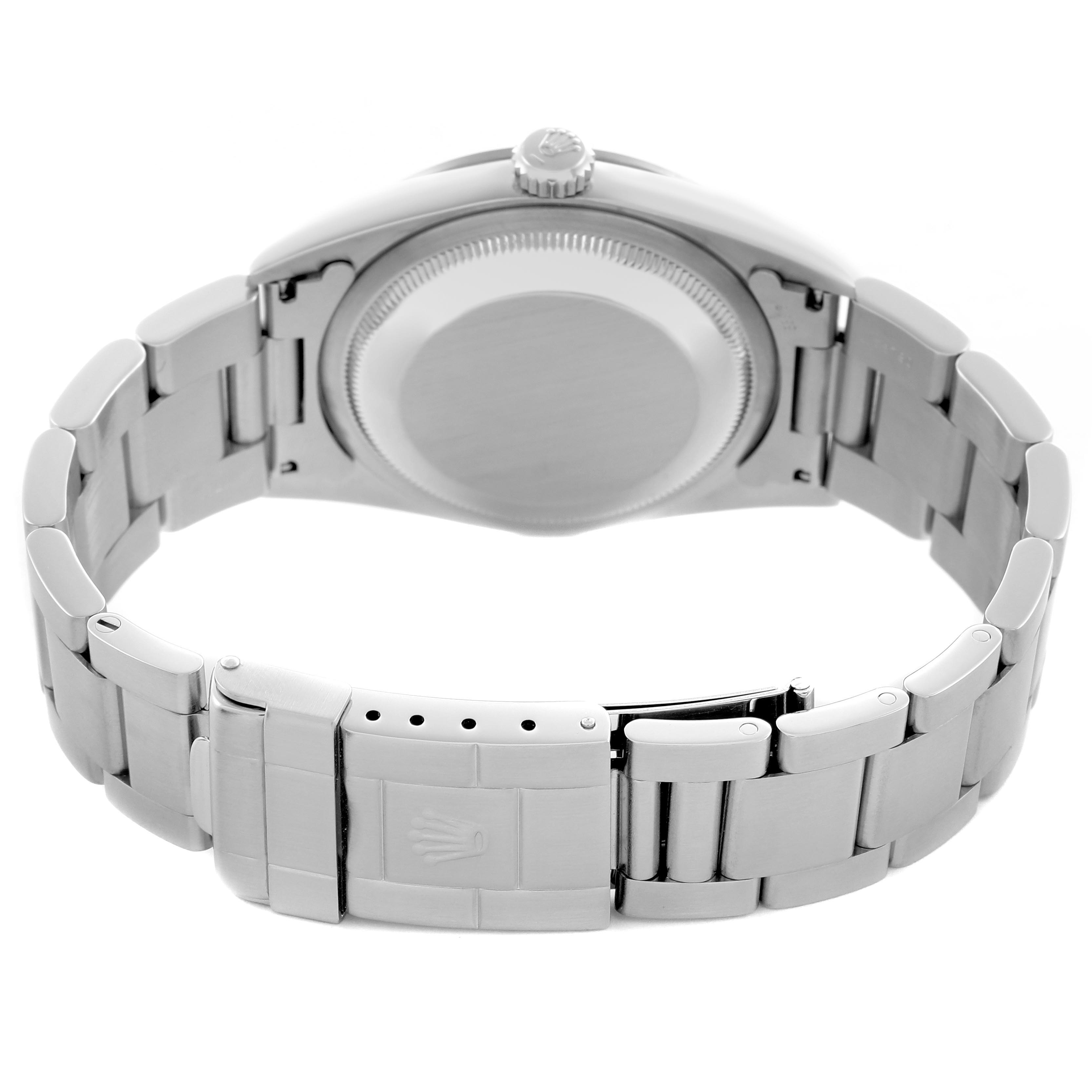 The image shows the back view of a Rolex Explorer 14270 Men's Stainless Steel Black Dial 14270 Men's Stainless Steel Black Dial watch, highlighting the case back, bracelet, and clasp.