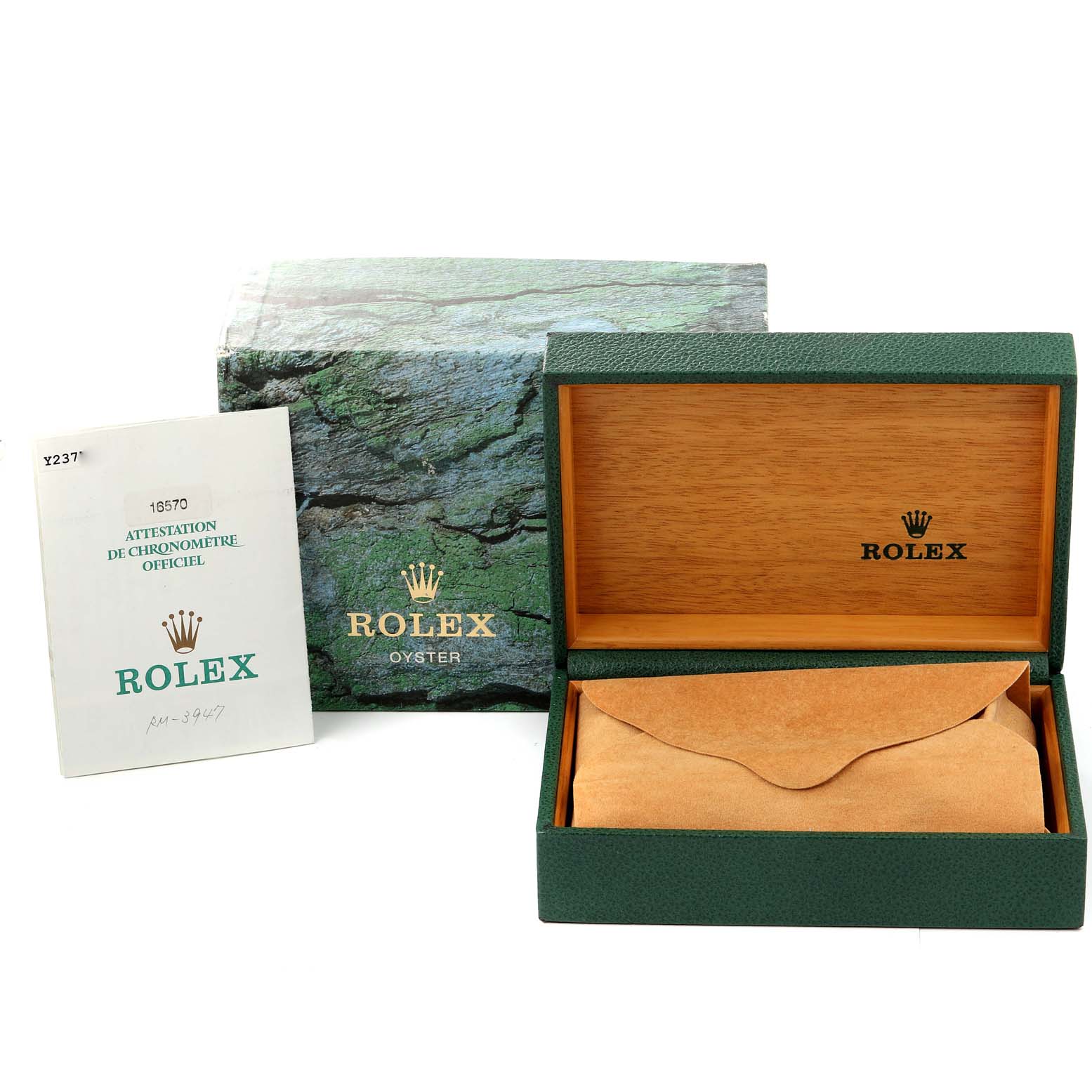 The image shows the packaging and documentation for a Rolex Explorer 16570 Men's Stainless Steel Black Dial 16570 Men's Stainless Steel Black Dial watch, including the box, outer cover, booklet, and cushion.