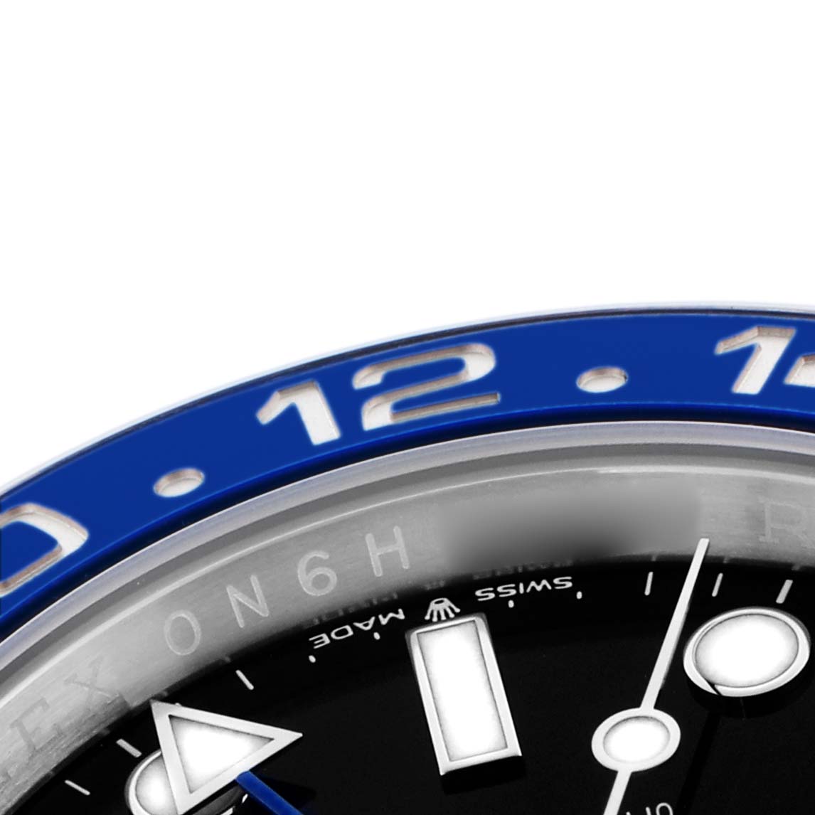The image shows a close-up of the Rolex GMT-Master 126710 Men's Stainless Steel Black Dial 126710 Men's Stainless Steel Black Dial's blue bezel and part of the dial with hour markers.
