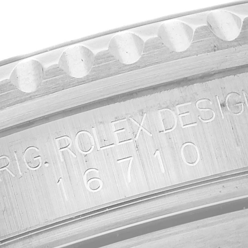 The image shows a close-up of the side of a Rolex GMT-Master 16710 Men's Stainless Steel Black Dial 16710 Men's Stainless Steel Black Dial watch, highlighting the model number "16710" engraving.