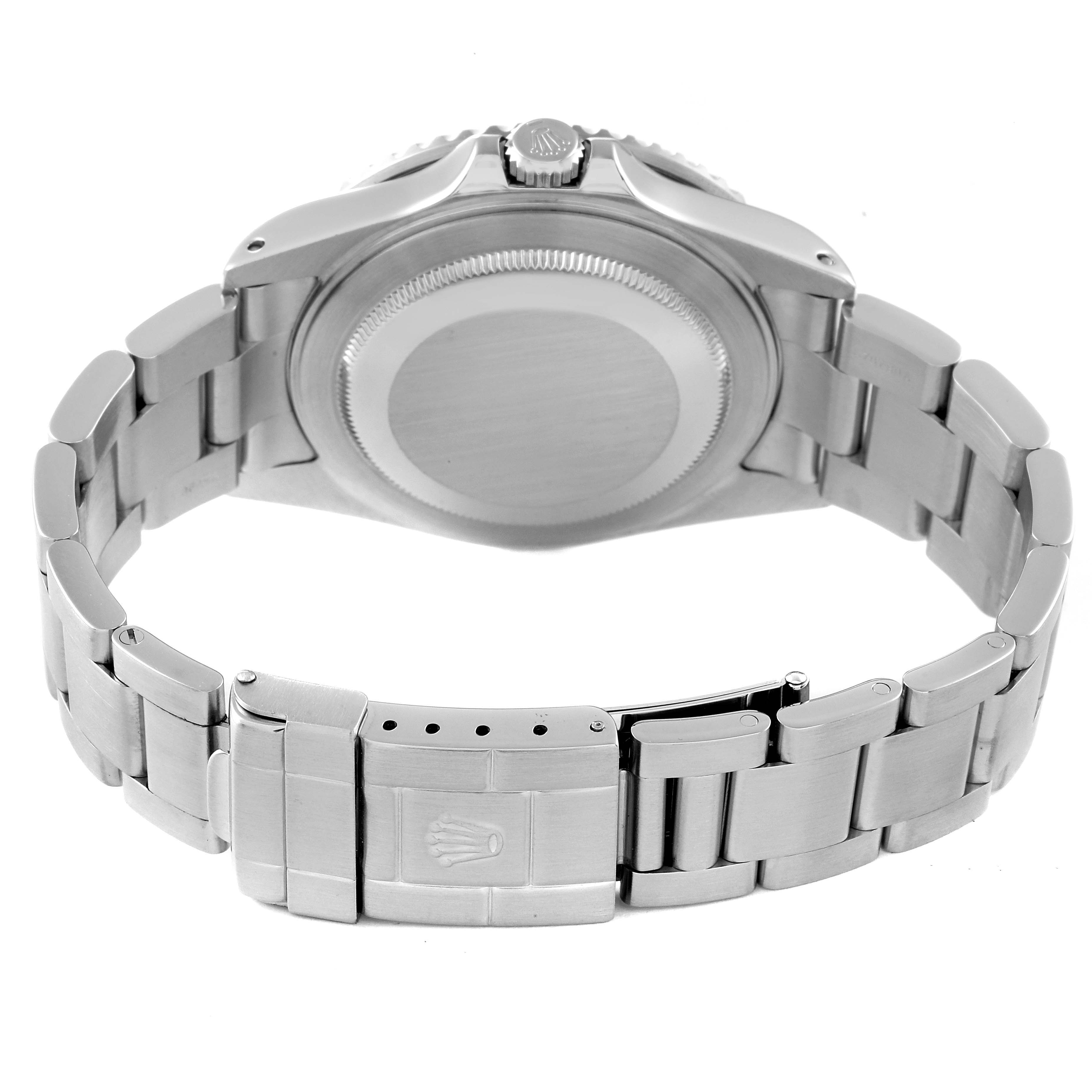 This image shows the back of the Rolex GMT-Master 16710 Men's Stainless Steel Black Dial 16710 Men's Stainless Steel Black Dial watch, highlighting its case, bracelet, and clasp from a rear angle.