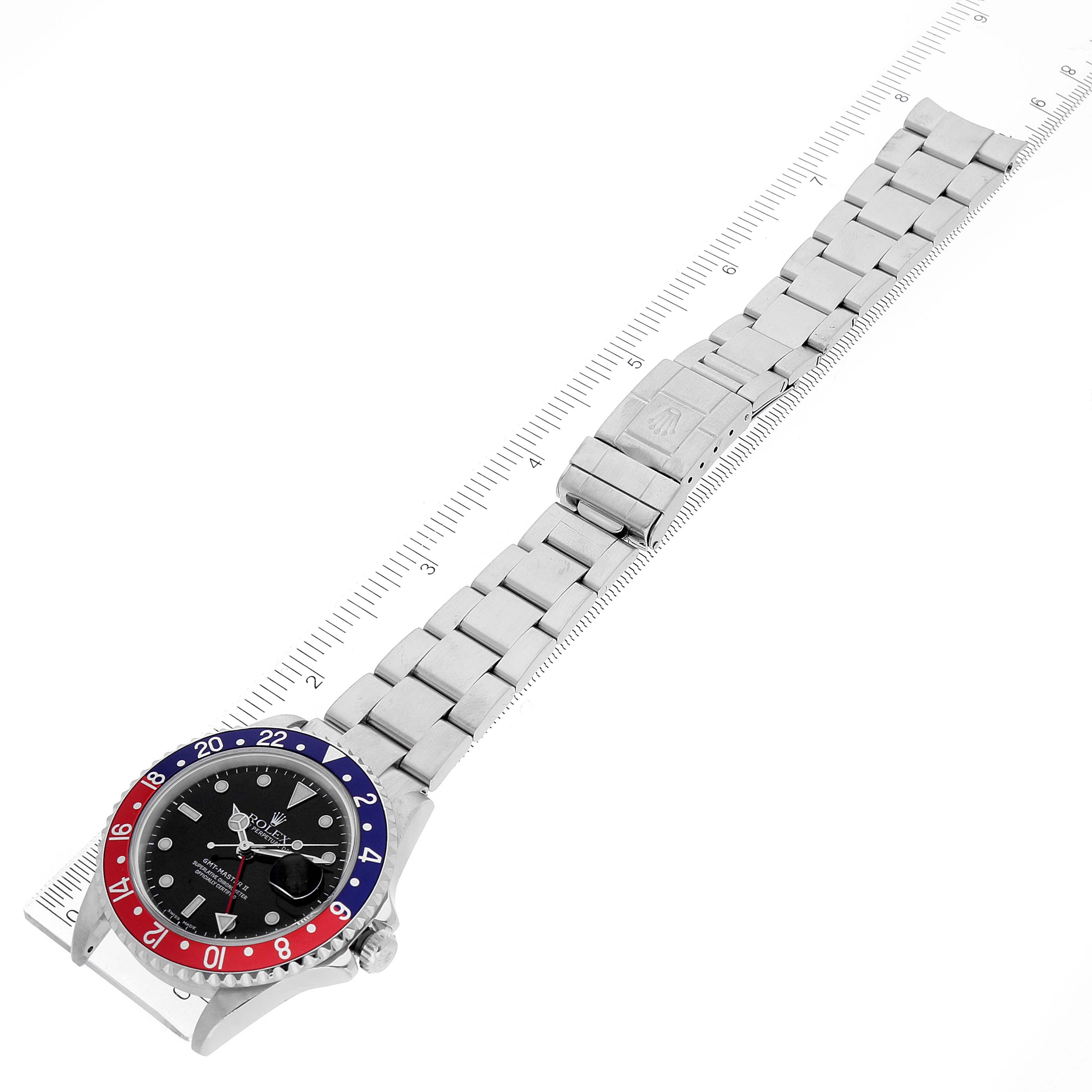 This image shows a top-down view of the Rolex GMT-Master 16710 Men
s Stainless Steel Black Dial 16710 Men
s Stainless Steel Black Dial watch, including its dial, bezel, and metal bracelet.